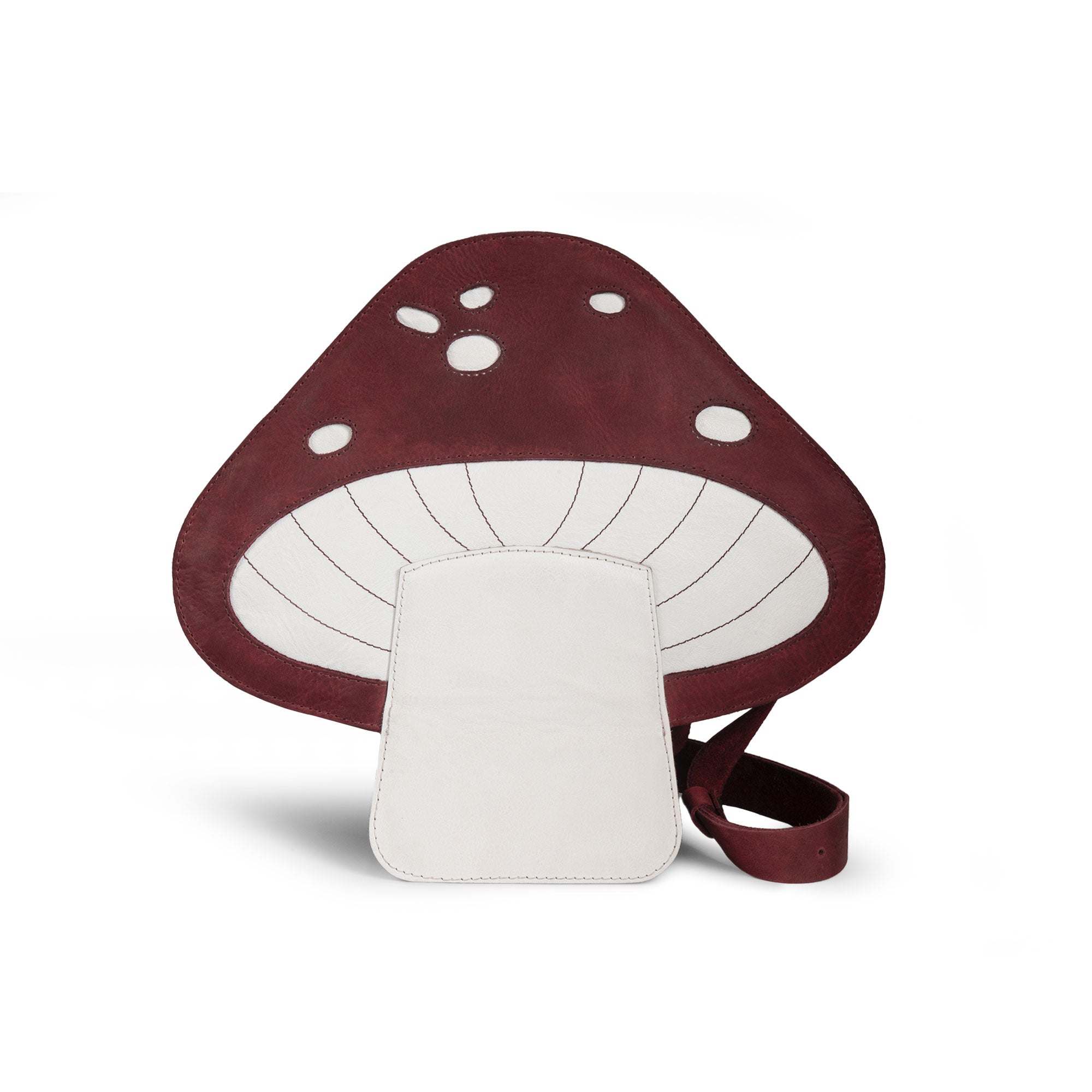 Mushroom-Shaped Leather Shoulder Bag by Tudi Frudi, featuring a whimsical design with an adjustable strap. This versatile crossbody bag is perfect for travel or as a messenger bag, crafted from Full Grain Leather, showcasing stockyardX's small batch production. Hand cut and sewn for quality, this artisan bag is handmade in La Antigua Guatemala.