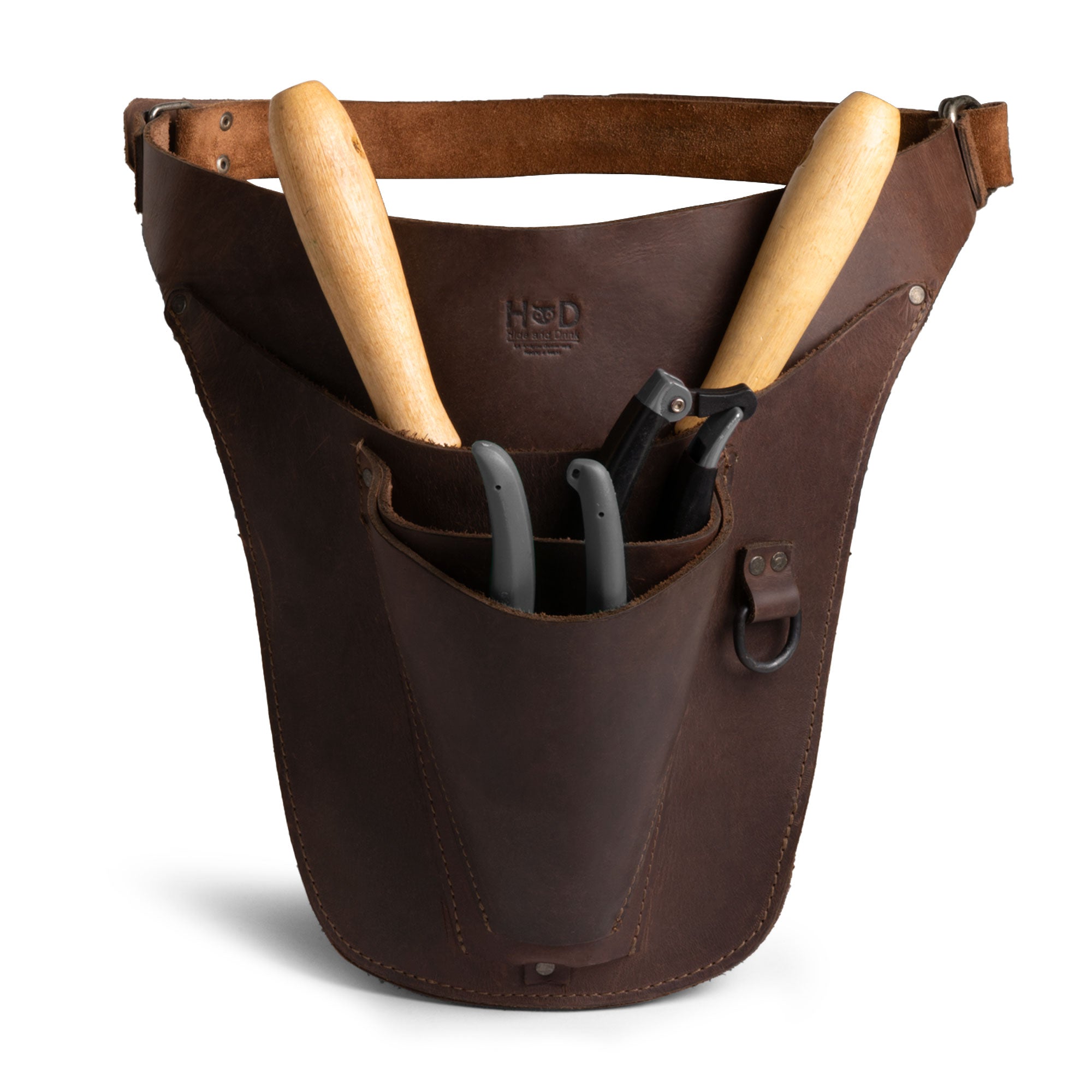 Hide & Drink Florist Tool Belt showcasing a rustic Full Grain Leather design. This Florist Tool Belt for Men & Women features adjustable straps and is perfect for gardening, crafting, or construction. Lightweight and ideal for electricians and carpenters, it's hand cut and hand sewn with fire-branded detail, crafted in La Antigua Guatemala & Oaxaca Mexico.