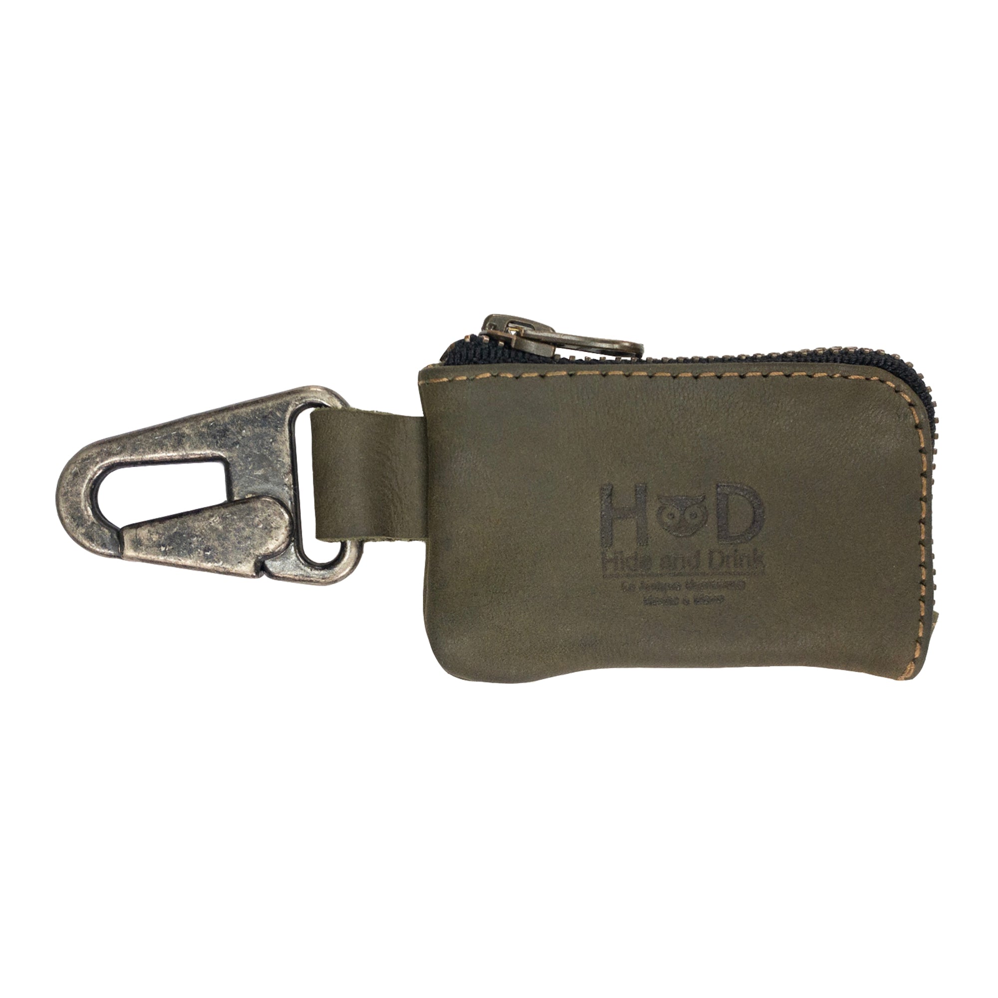 Hide & Drink Car Key Holder with packaging, highlighting its artisan quality and capacity for cash and small items like charging cables and memory cards, held securely with a Nickel Metal Clasp. StockyardX, Small Batch Production, Hand Cut, Hand Sewn, Fire Branded, Artisan, Handmade in La Antigua Guatemala & Oaxaca Mexico.