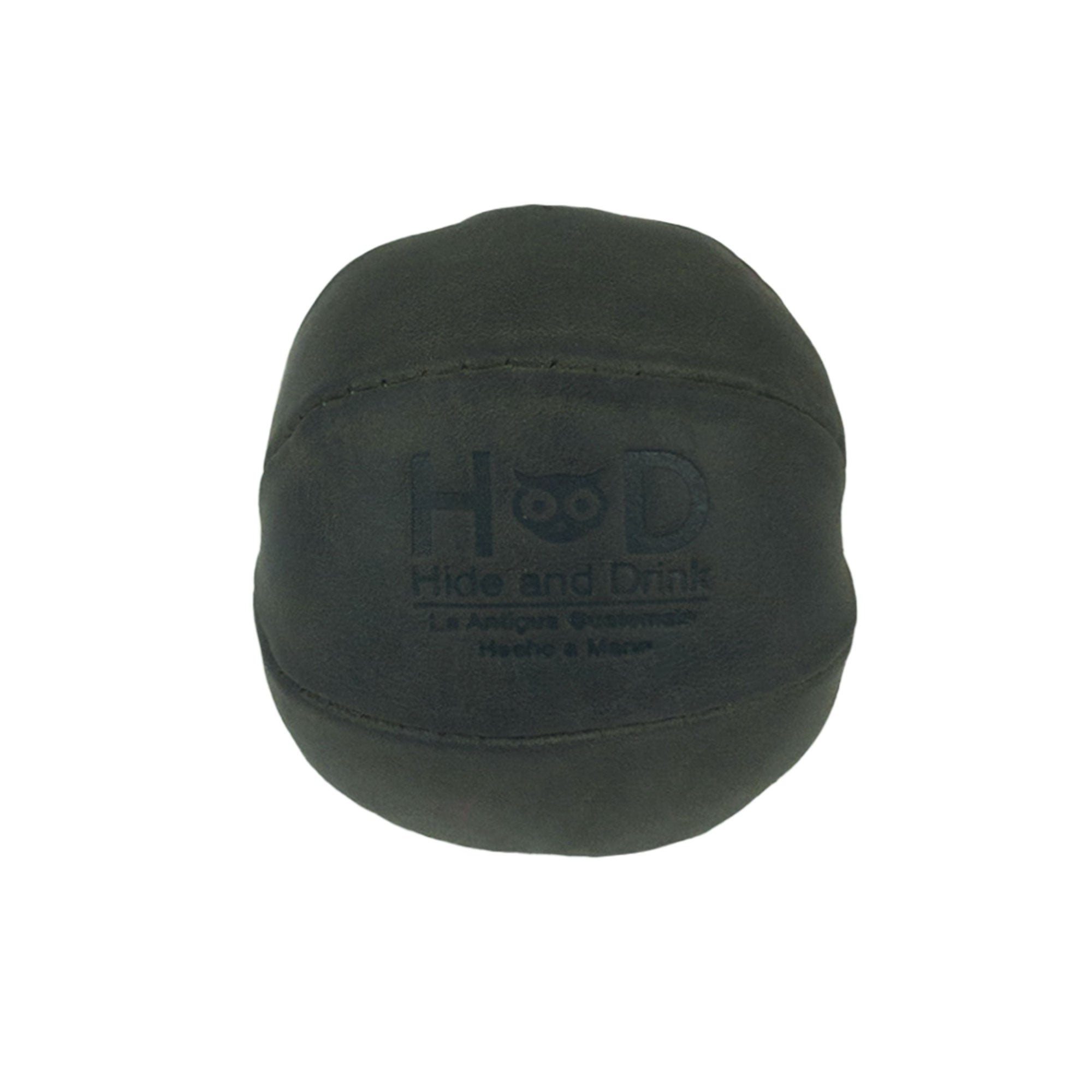 Hide & Drink green Stress Ball showcasing its distinct color, designed to relieve fidgeting and anxiety. This squishy tension accessory blends classic style with full grain leather, handcrafted in La Antigua Guatemala.