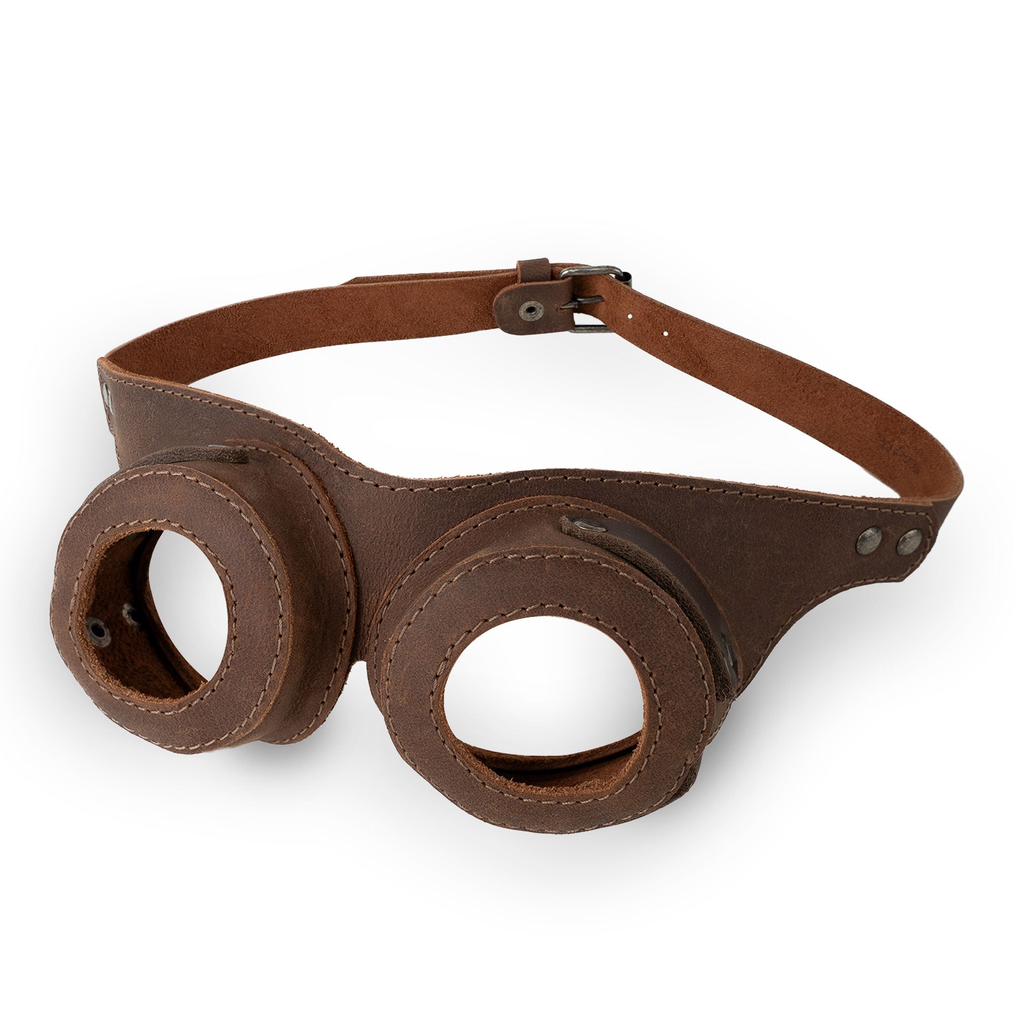 Steampunk Style Goggles by Hide & Play, showcasing a retro cosplay prop designed from full grain leather. These handcrafted goggles feature an adjustable strap and intricate details, making them a perfect accessory for costume enthusiasts. Ideal for mad scientist looks, these artisanal pieces are made in La Antigua Guatemala & Oaxaca Mexico.