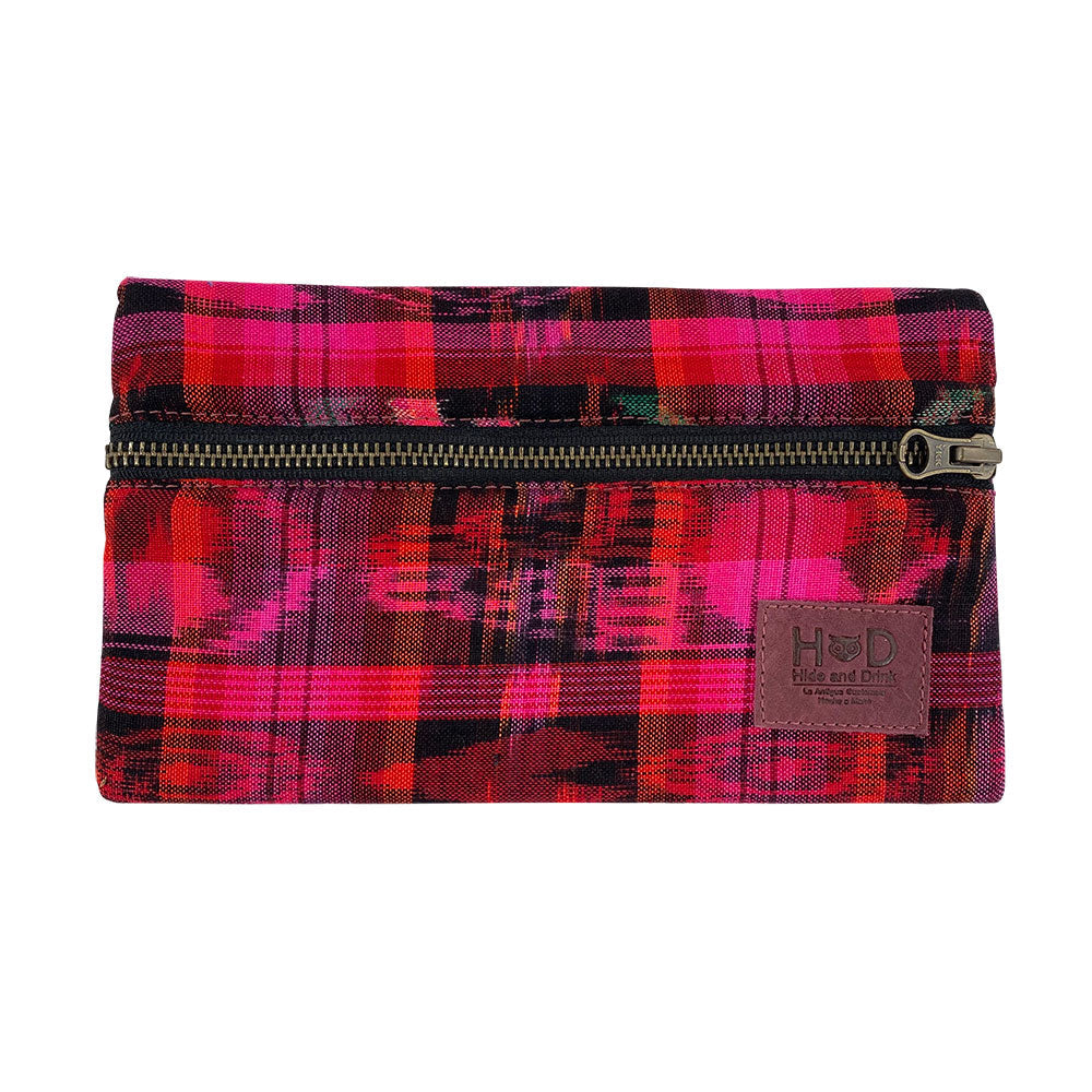 Hide & Drink Utility Cord Pouch presented to highlight its handmade quality and functional use. This pouch serves as a superb all-purpose utility & charger case for MacBook, iPad & Laptop, as well as an elegant cable organizer, crafted in La Antigua Guatemala & Oaxaca Mexico.