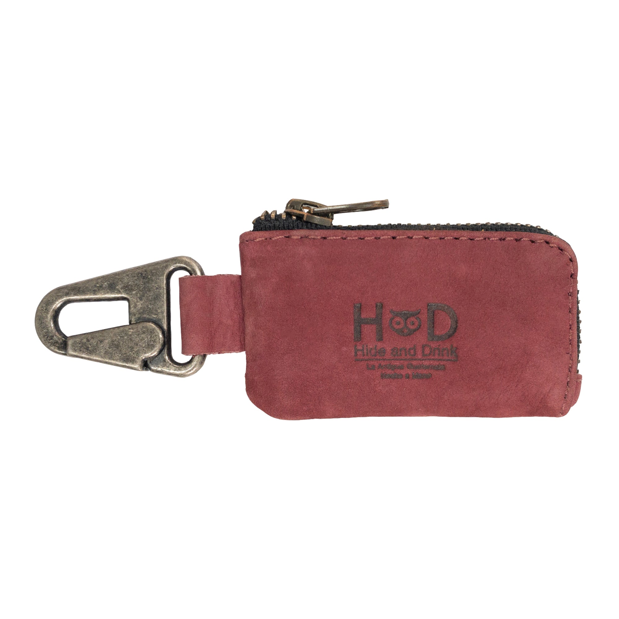 Stylish Car Key Holder by Hide & Drink in a classic design, perfect for securing keys and cash while storing Headphone and charging Cables, Memory Cards, and Flash Drives. Made from premium Full Grain Leather with a durable Nickel Metal Clasp, reflecting Small Batch Production and Artisan skills from La Antigua Guatemala & Oaxaca Mexico.