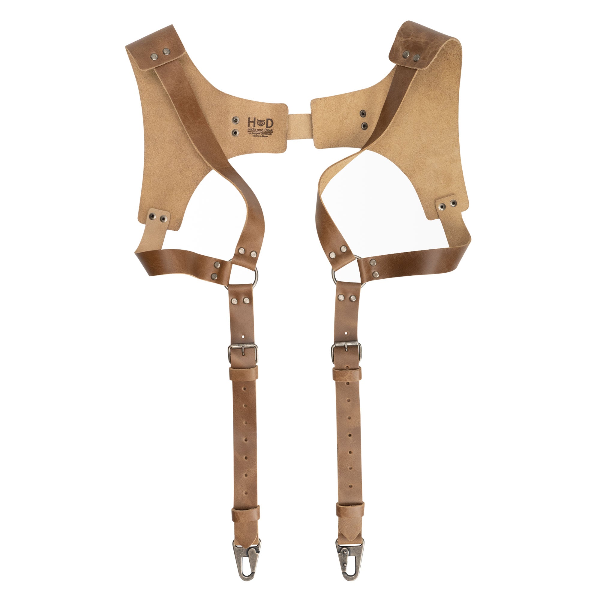 Tan version of Renaissance Suspenders by Hide & Drink, emphasizing their stylish design. This back support harness for men is perfect for groomsmen, made from fine full grain leather with artisan details.