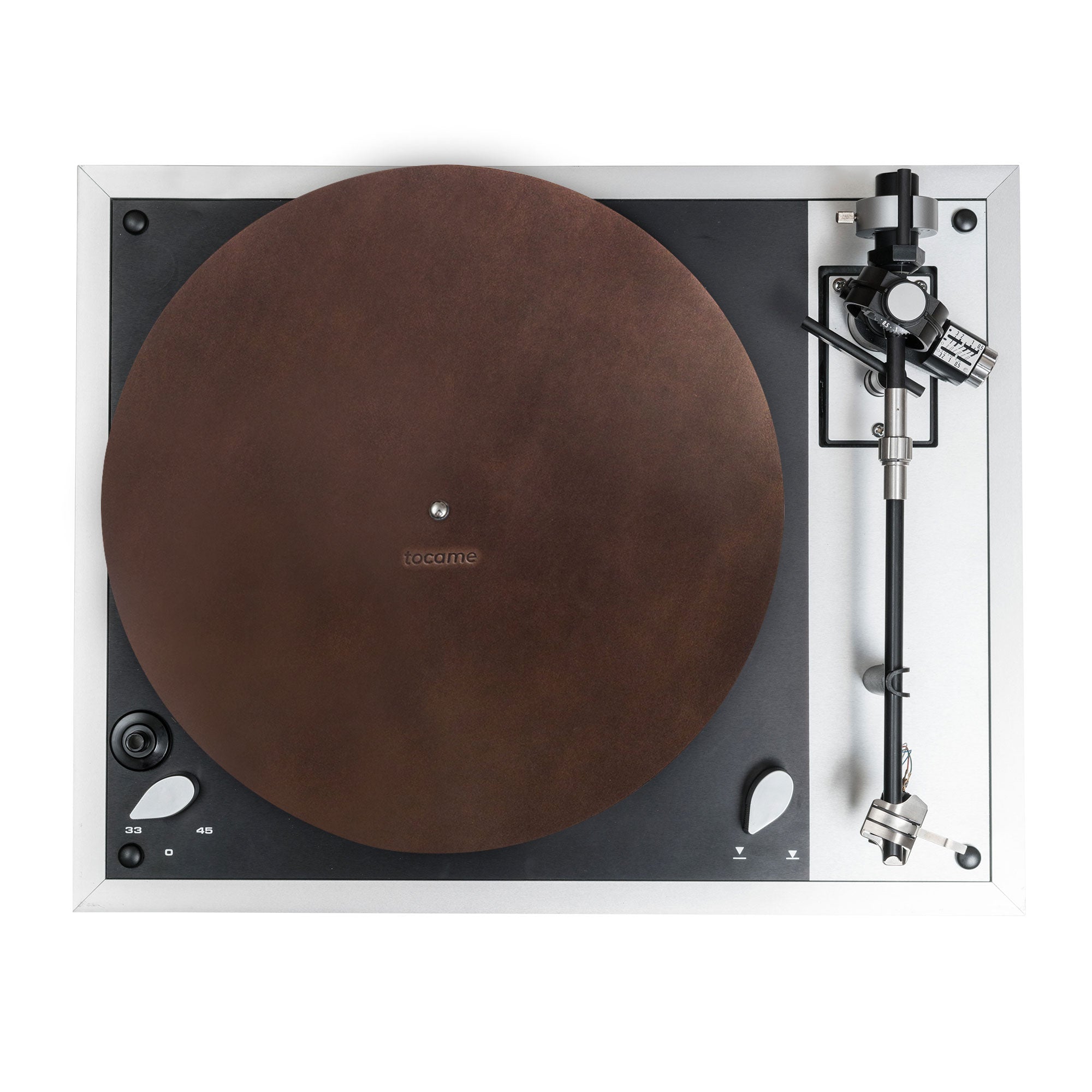 Close-up view of the classy Circular Turntable Slipmat by tocame, made from full grain leather. This antistatic cover reduces noise and sounds from static and dust. Artisan crafted in La Antigua Guatemala, showcasing small batch production, hand cut, and fire branded details.