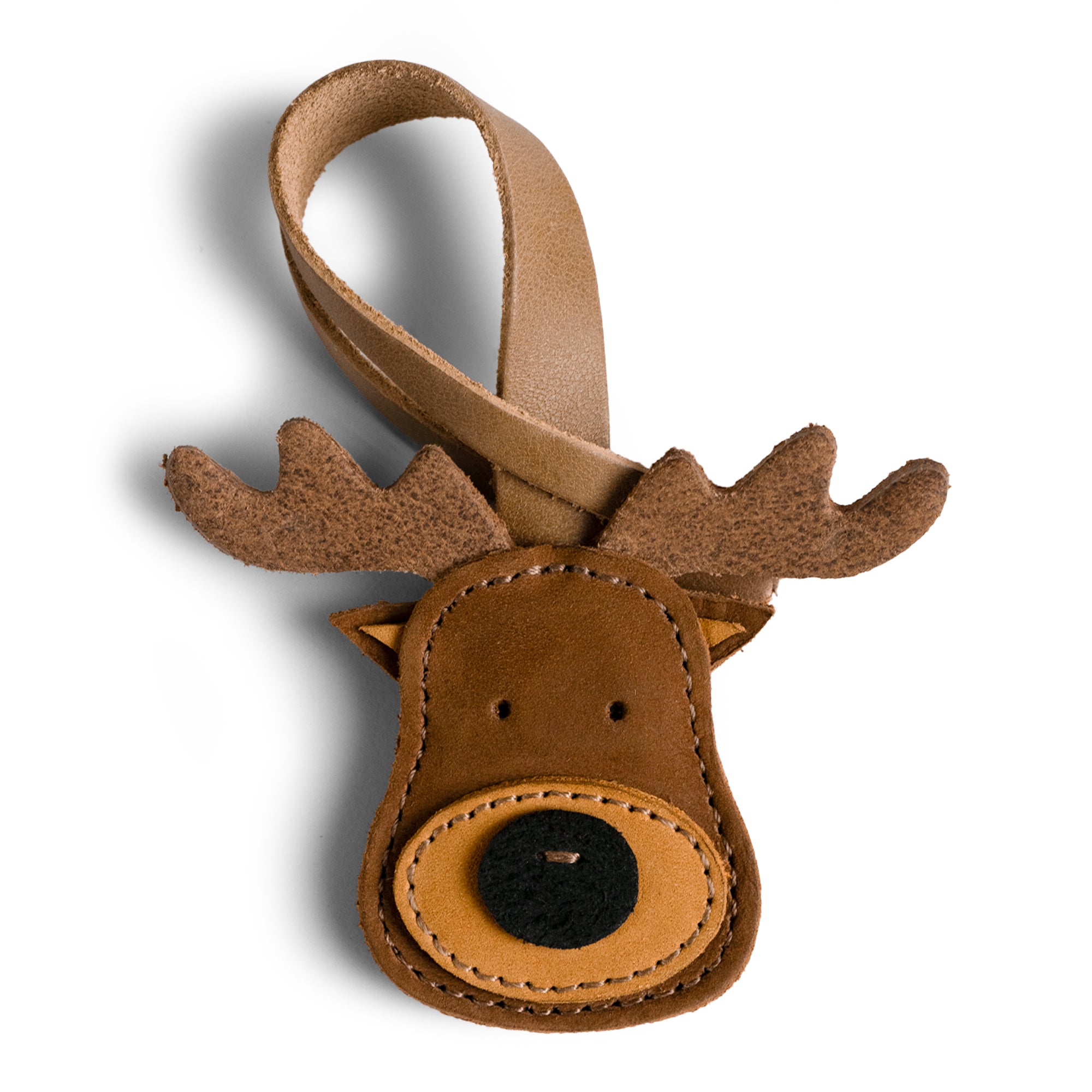 Hide & Drink Bag Charms featuring a delightful dolphin design, an ideal charm for handbags. This purse charm for tote & backpacks is crafted from high-quality full grain leather, showcasing StockyardX's commitment to small batch production. Each piece highlights meticulous hand cut, hand sewn craftsmanship and fire branding, handmade in La Antigua Guatemala & Oaxaca Mexico.