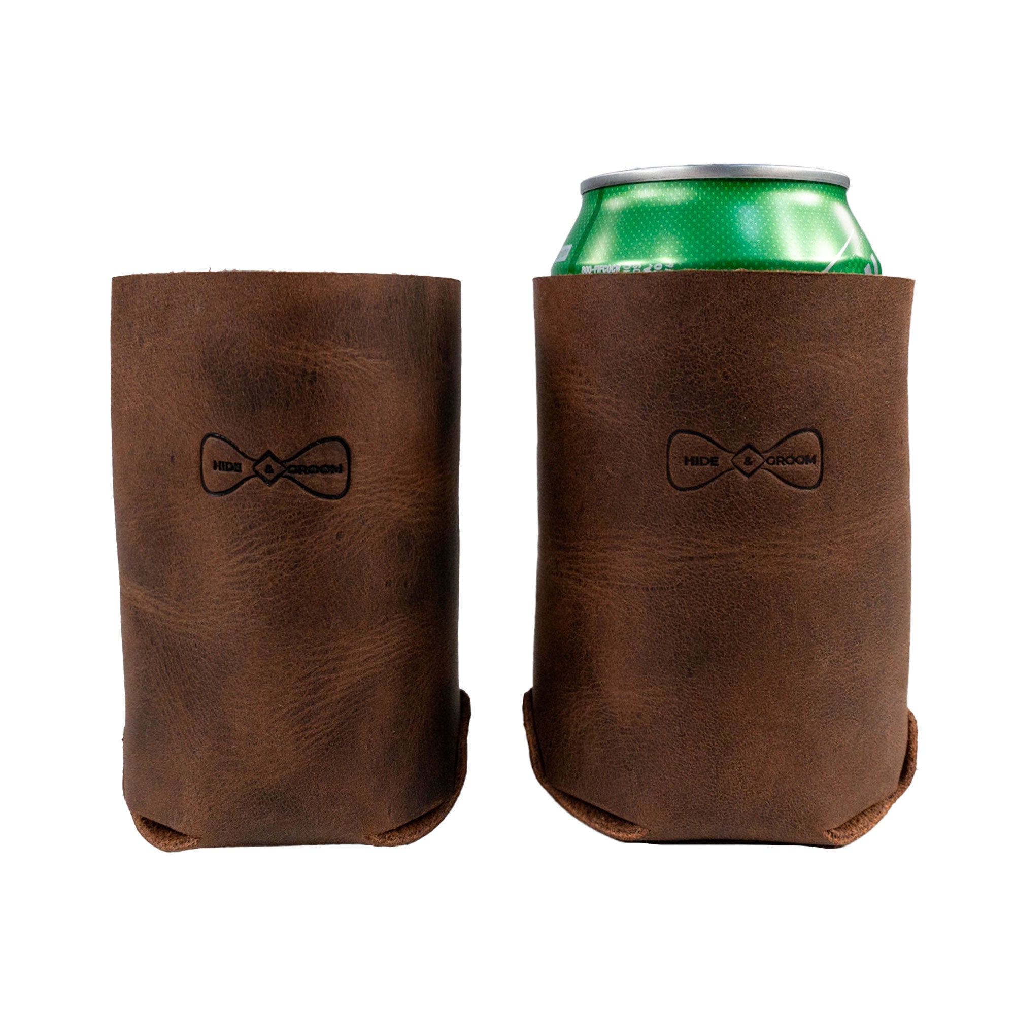 Showcasing the Hide & Groom Beer Can Sleeve (Set of 2), these rustic, collapsible, full grain leather sleeves are perfect accessories for weddings. Best Man Accessories that fit standard cans, handmade in La Antigua Guatemala & Oaxaca Mexico, they are hand cut, hand sewn, and fire branded for durability.