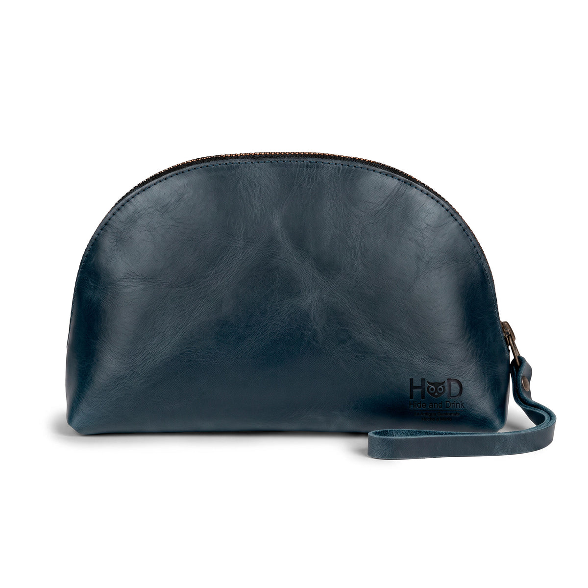 Another angle of the Accessory Pouch Organizer Hand Bag from Hide & Drink, made from premium brown full grain leather. Ideal as a Cosmetic Travel Organizer with Hand Strap for Women, it’s a stylish Makeup Bag or Classic Handbag, reflecting artisan craftsmanship from La Antigua Guatemala & Oaxaca Mexico.