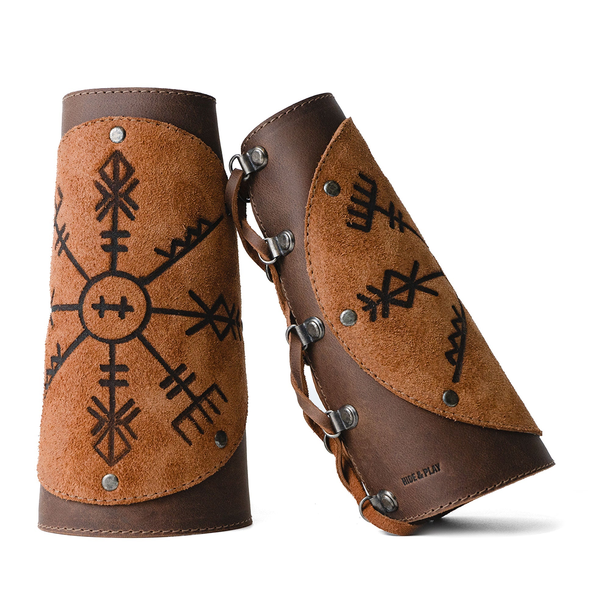 Viking Bracers by Hide & Play showcasing a detailed design on a set of 2 Viking Style Bracers, perfect accessory for cosplay as arm protectors for costume. Made from full grain leather, these artisan products are hand cut and hand sewn, fire branded, and crafted in La Antigua Guatemala & Oaxaca Mexico.