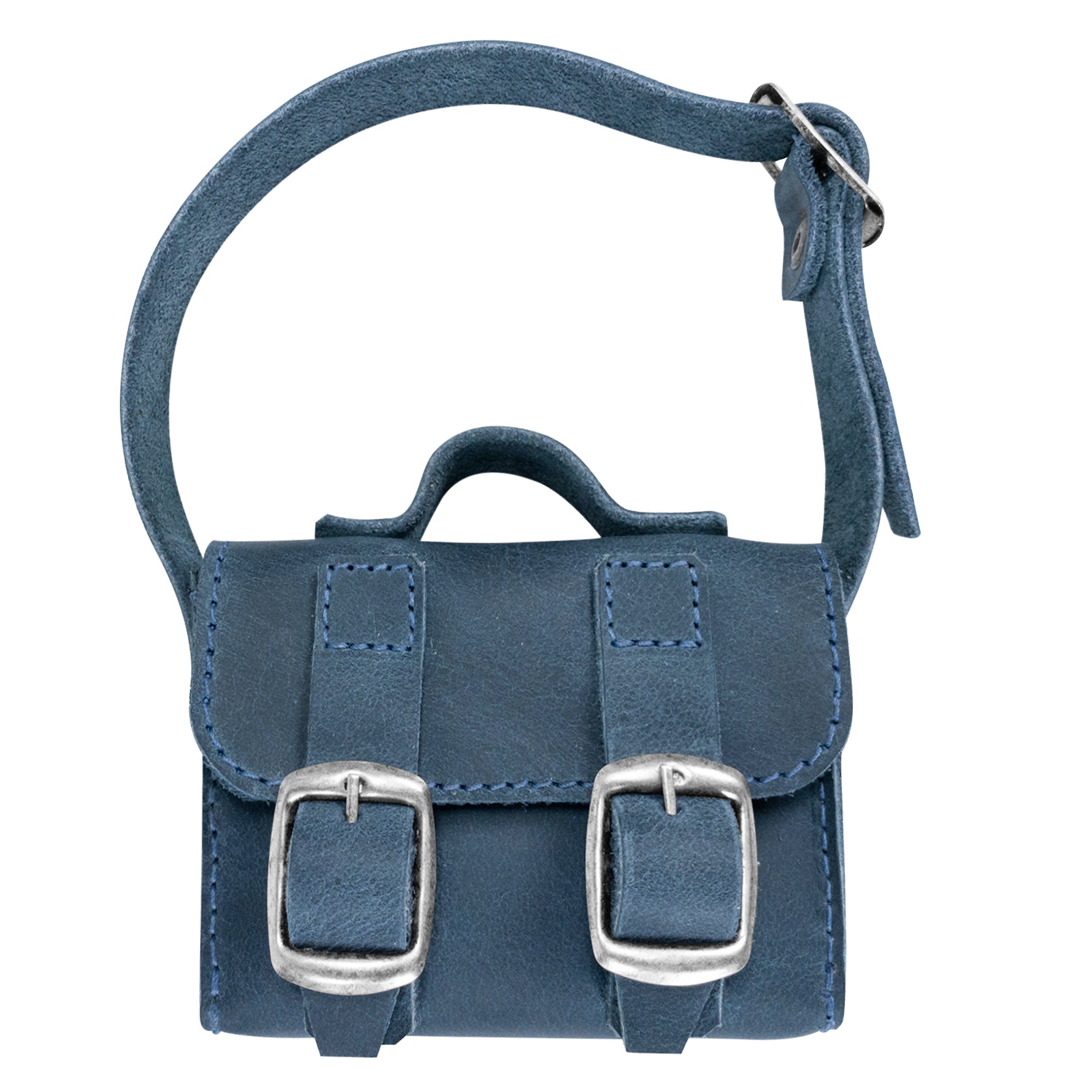 The deep blue Tiny Messenger Bag by Hide & Drink, a unique Mini Messenger Bag Charm crafted from rich Full Grain Leather. This artisanal piece is perfect as a keychain or handbag accent, showcasing meticulous handmade quality from La Antigua Guatemala.
