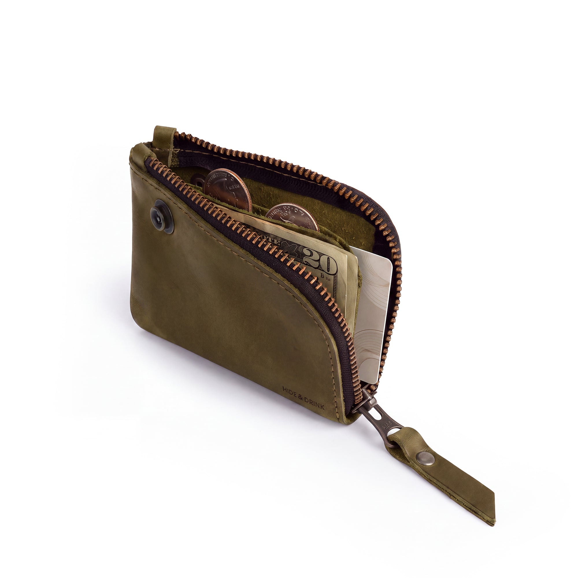 Interior view of the Lion's Mane Zippered Wallet by Hide & Drink, displaying its ample space for coins and cards, combining convenience with artisan quality.