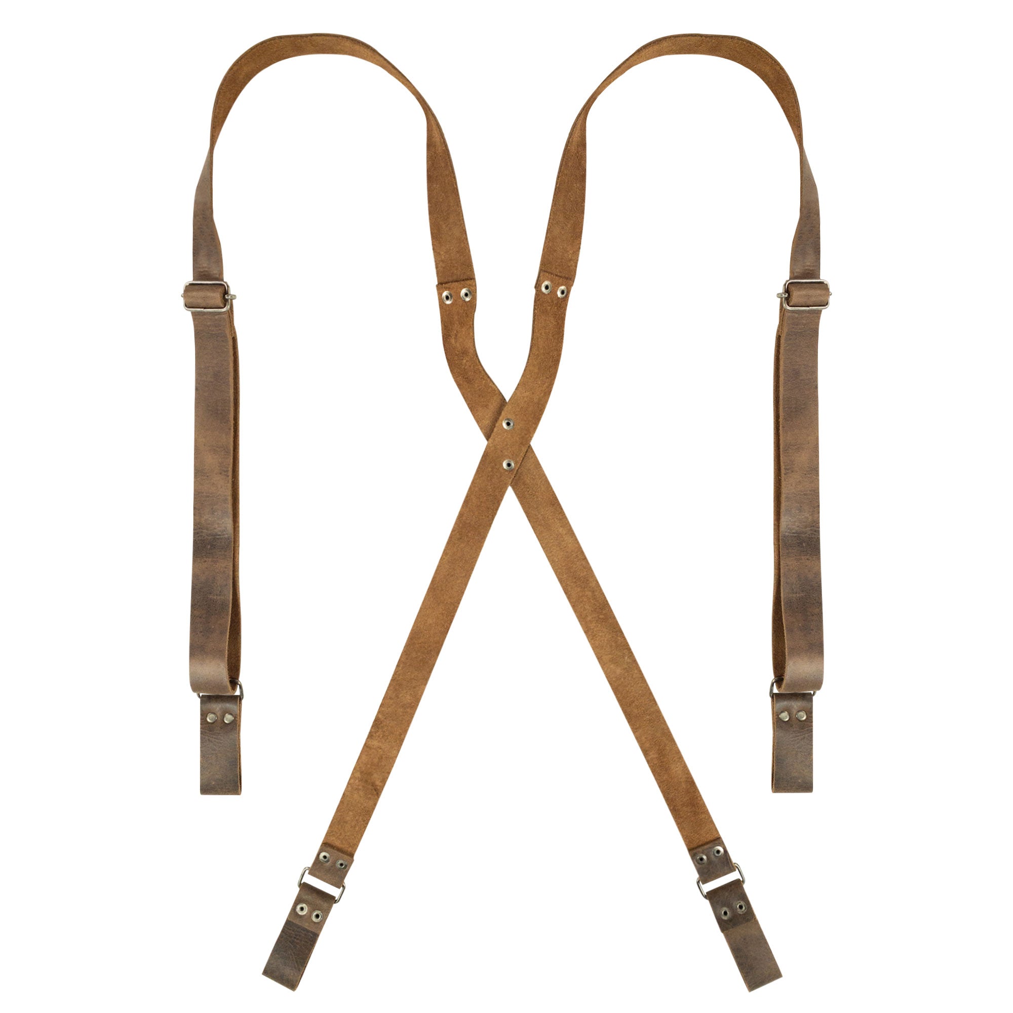 Riveted X Back Suspenders with Belt Loops by Hide & Groom showcase a durable heavy-duty leather design, perfect for weddings and steampunk events. This artisan-crafted piece is handmade in La Antigua Guatemala using full grain leather, featuring small batch production and fire branded details.