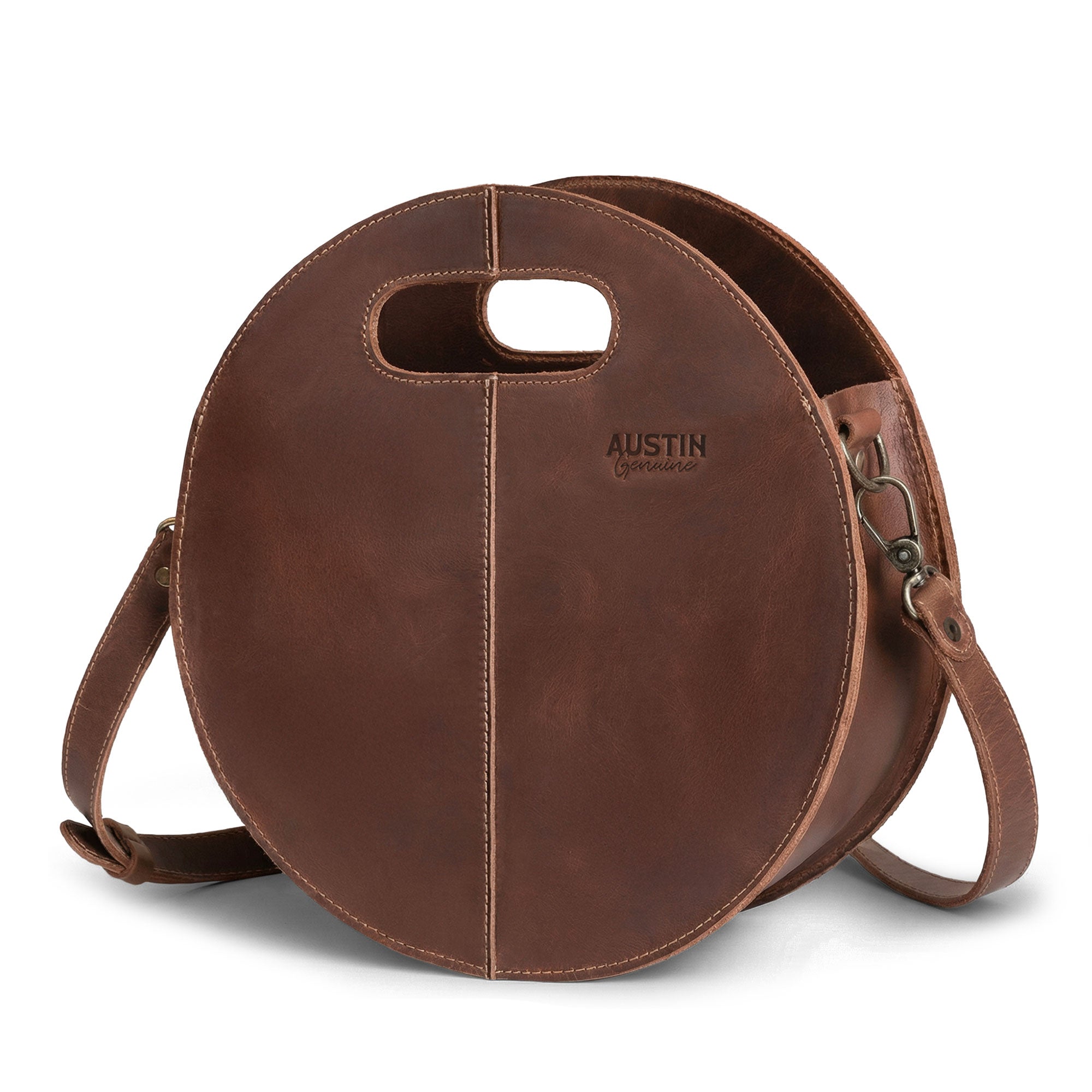 The Pecan Shoulder Bag by Austin Genuine, showcasing a circular design crafted from full grain leather, highlighting the small batch production and artisan craftsmanship, hand cut and hand sewn, fire branded detail, made in La Antigua Guatemala & Oaxaca Mexico.