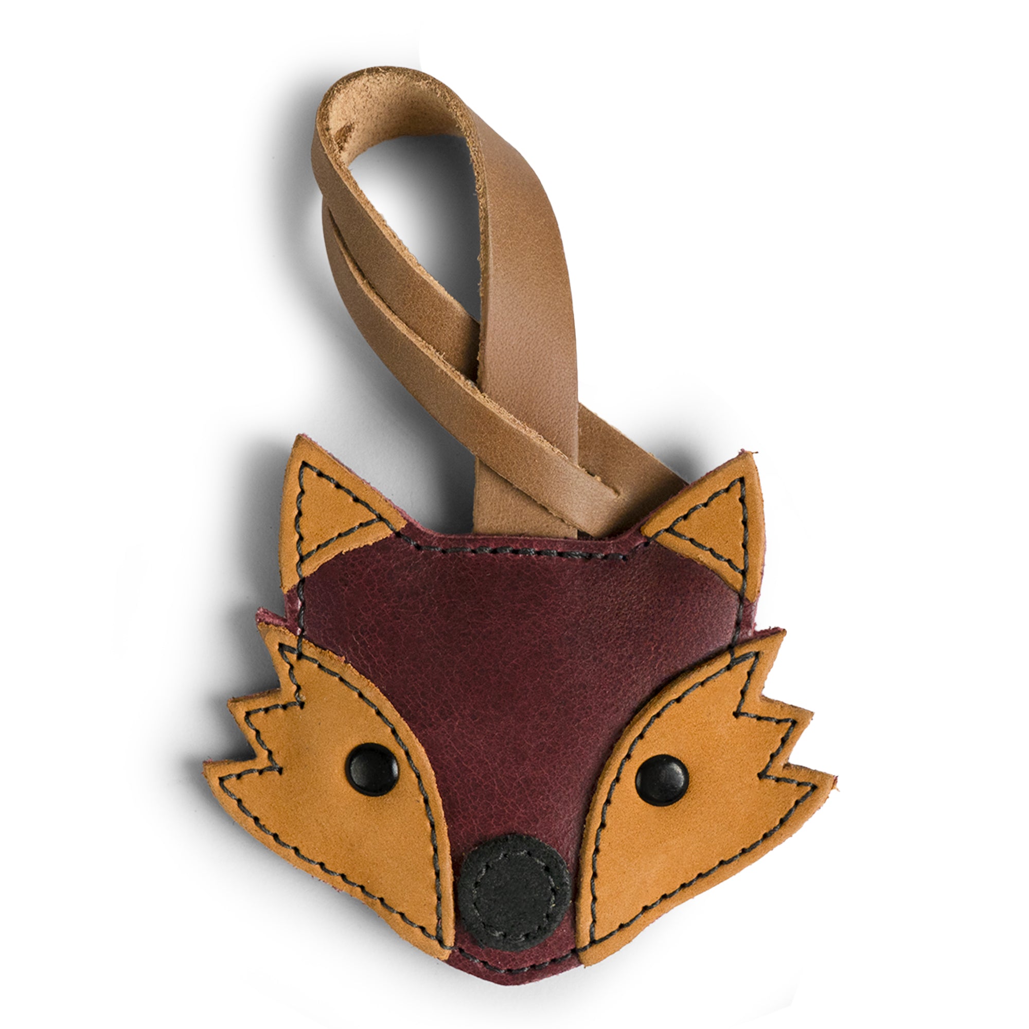 Hide & Drink Bag Charms showcasing a cheerful ladybug design, making it a lovely charm for handbags. This purse charm for tote & backpacks is crafted from premium full grain leather, highlighting StockyardX's commitment to small batch production. Each piece exemplifies meticulous hand cut and hand sewn craftsmanship with fire branding, handmade in La Antigua Guatemala & Oaxaca Mexico.