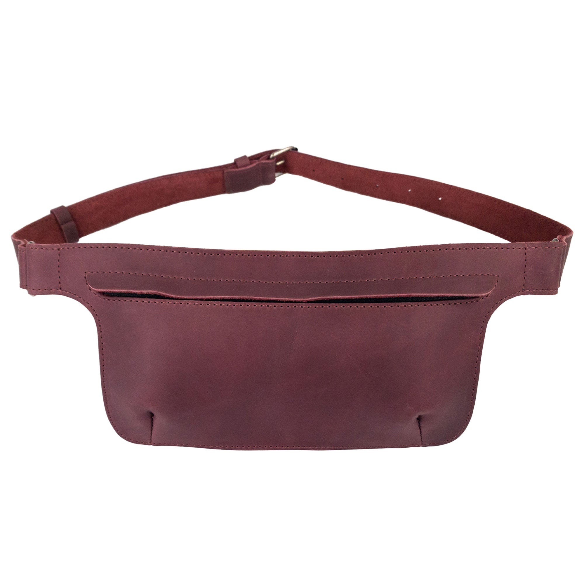 Slim Fanny Pack by Hide & Drink featuring a vibrant maroon color, showcasing an adjustable strap and compact design for ease of use. This artisan waist bag is made from full grain leather and ideal for everyday carrying.