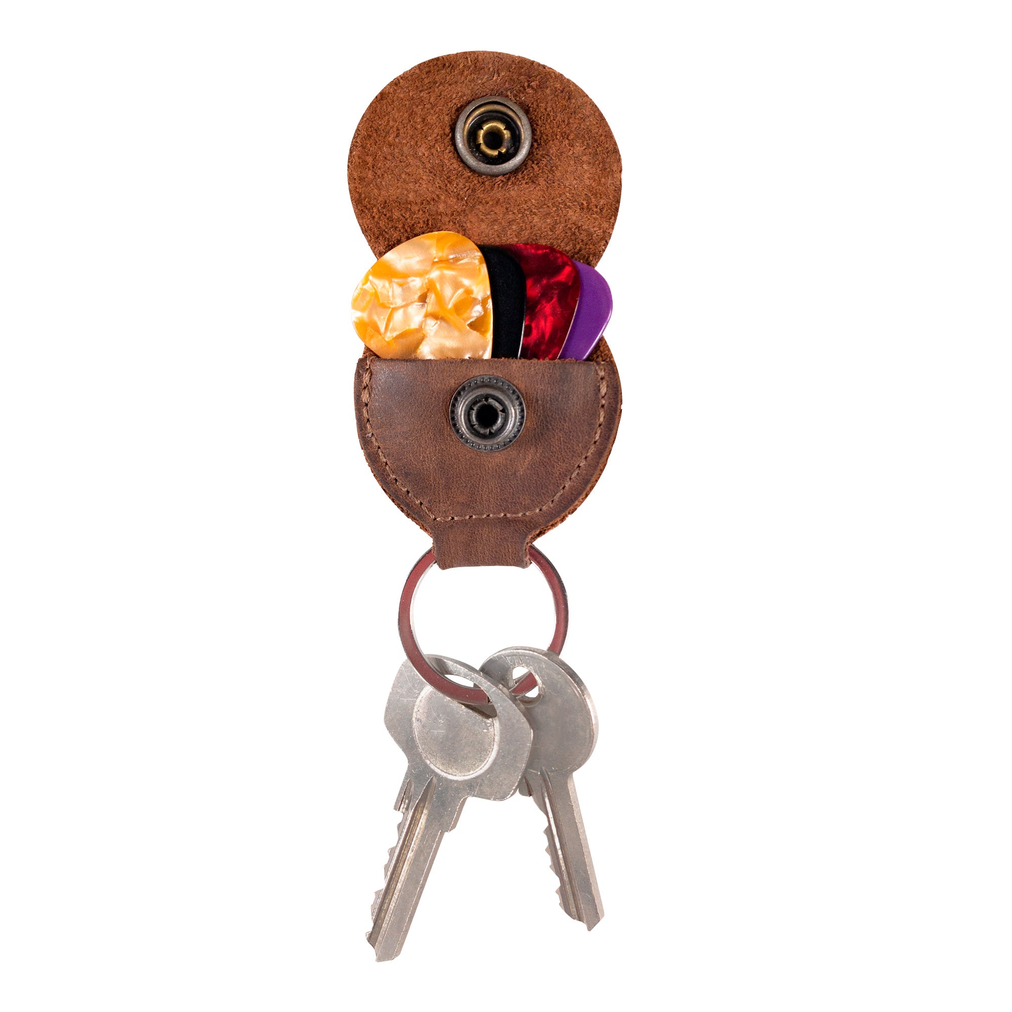 Showcasing the Key Chain & Guitar Pick Holder by Hide & Drink, this image features a compact Guitar Pick Holder with Ring and key organizer design. Perfect for guitar players, it emphasizes its Full Grain Leather craftsmanship, highlighting the small batch production and artisan quality with hand cut and hand sewn details, all made in La Antigua Guatemala & Oaxaca Mexico.