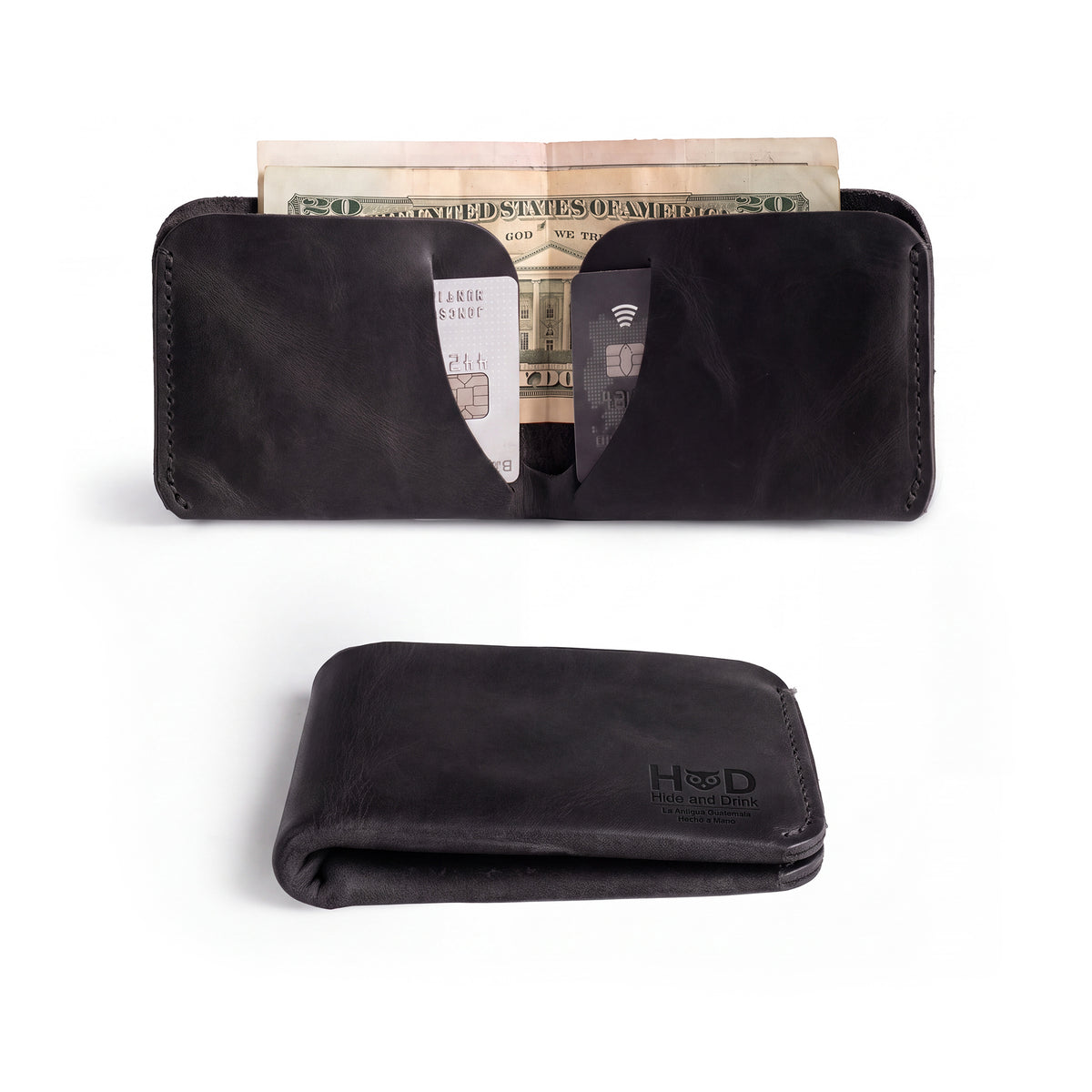 Side view of the Hide & Drink Minimal Wallet in jet black Full Grain Leather, depicting its smooth texture. This Classic Slimfold Wallet serves as a Card Organizer Holder and Travel Accessory, showcasing the artistry of Small Batch Production by artisans in La Antigua Guatemala & Oaxaca Mexico.