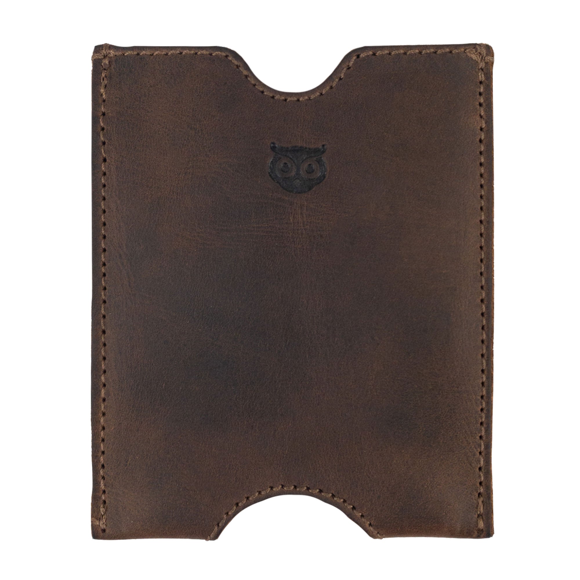 Hide & Drink Passport Sleeve made of Full Grain Leather, showcasing the sleek design of this Travel Passport Pocket Sleeve. Hand cut and hand sewn, this artisan-crafted item is fire branded and perfect for stylish travelers.