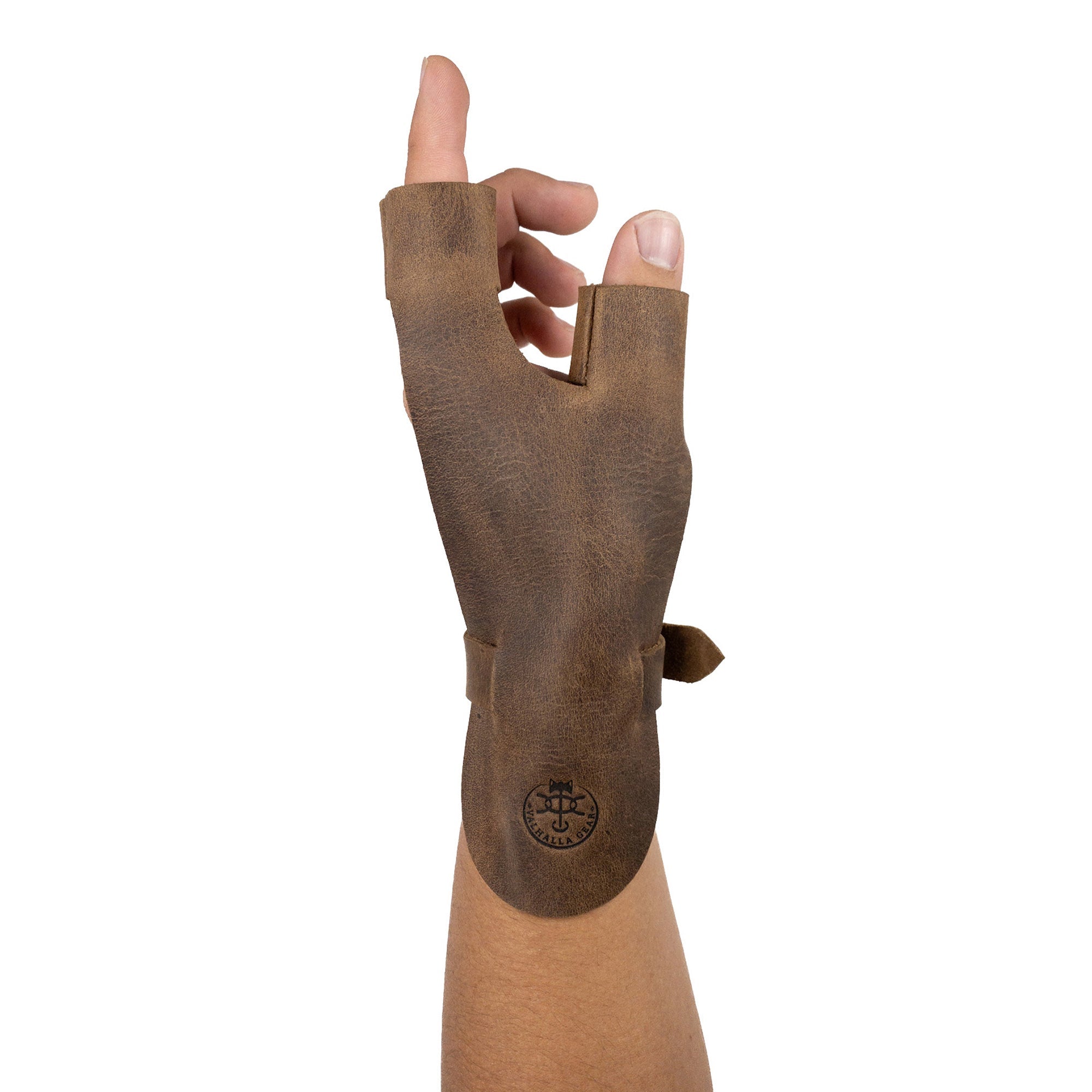 A hand wearing the Valhalla Gear Archery Shooting Glove, showcasing the handmade design perfect for archers. This Full Grain Leather glove serves as a Hand Guard and Wrist and Finger Protector, ideal for using a Recurve Bow while target shooting or participating in cosplay events. Crafted from artisan materials in La Antigua Guatemala, it's a perfect accessory for enthusiasts.