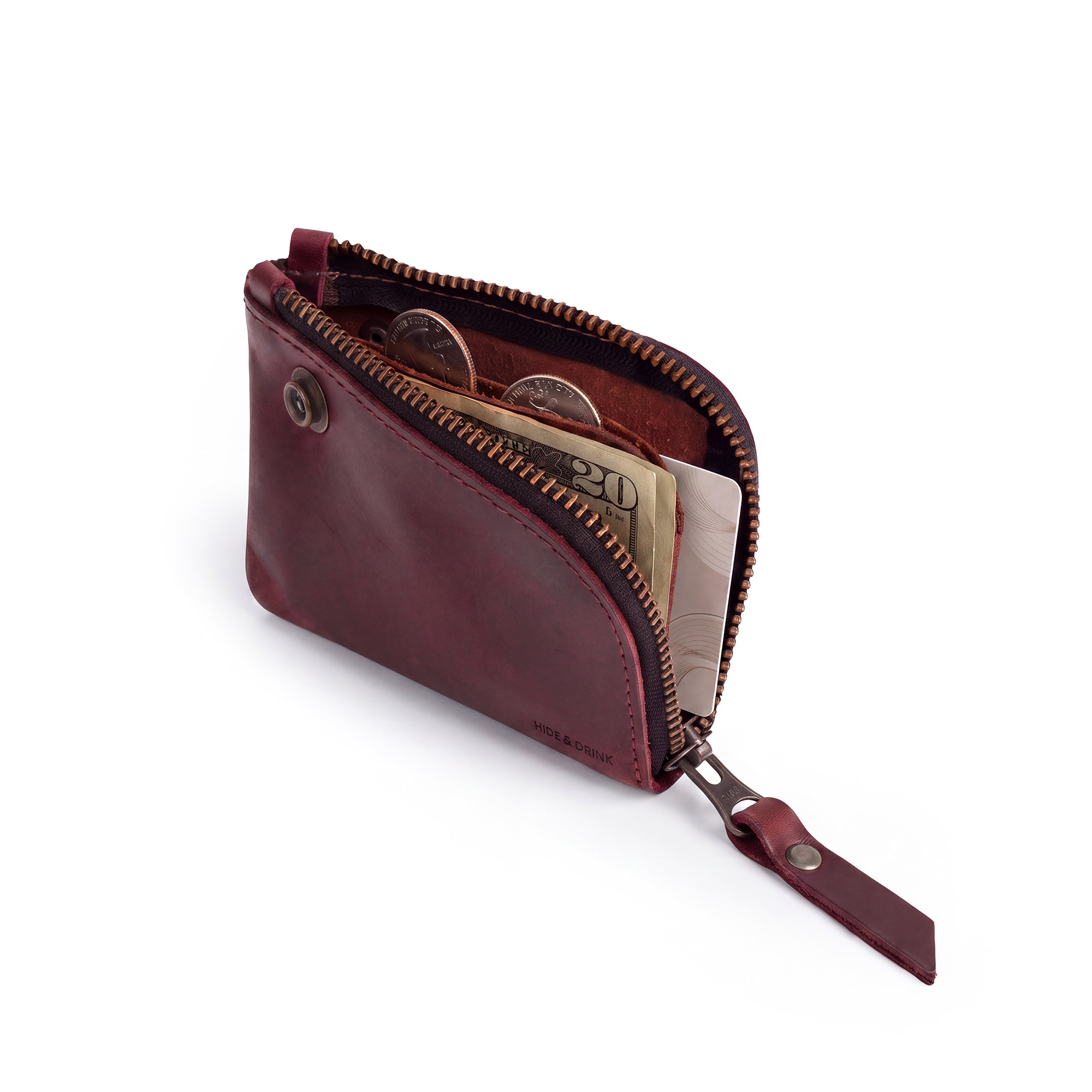 Lion's Mane Zippered Wallet by Hide & Drink, illustrating its spacious interior for cards and cash, an essential piece for any minimalist.