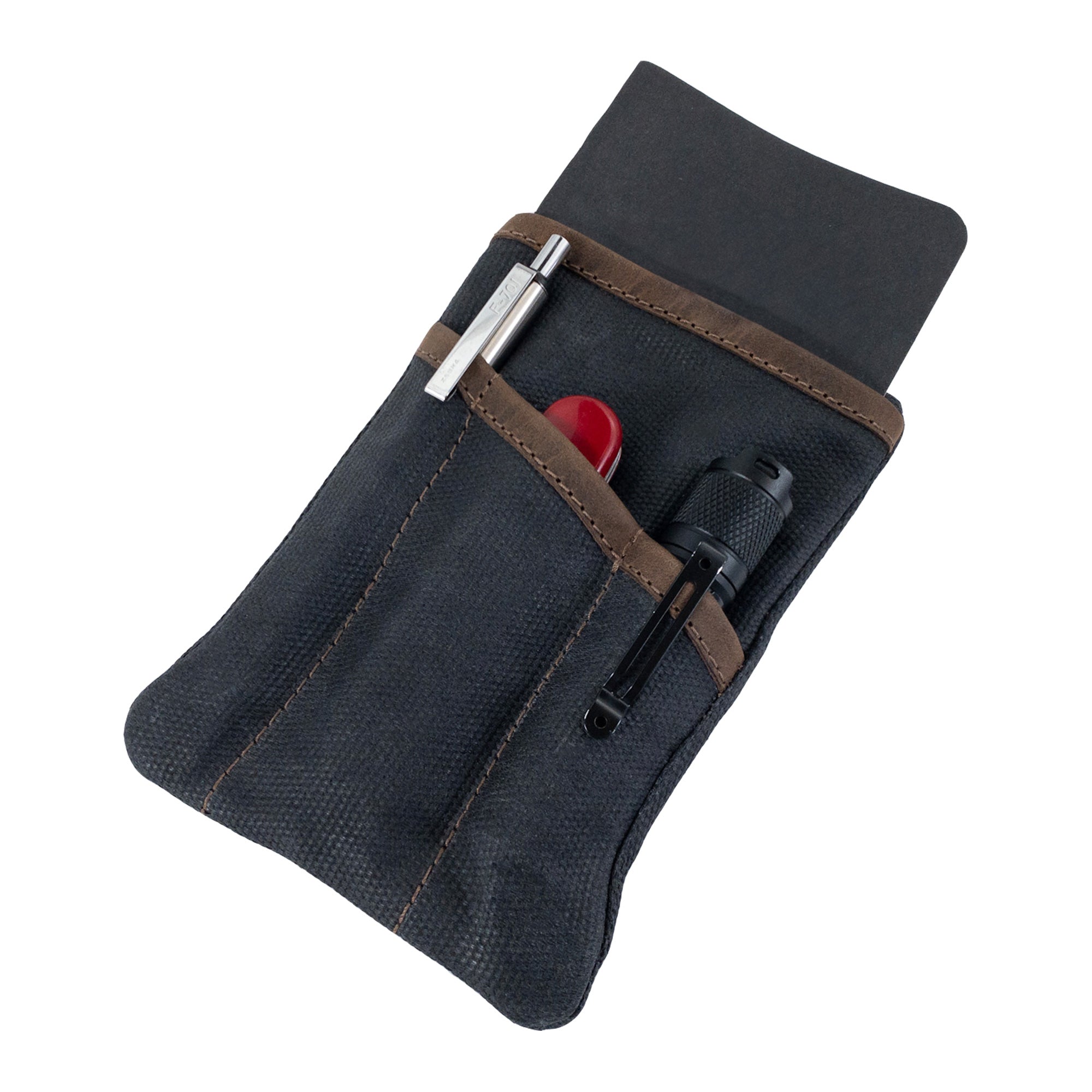 Multi-tool Pocket Pouch by Hide & Drink in red, highlighting its robust design and suitability for various outdoor activities.