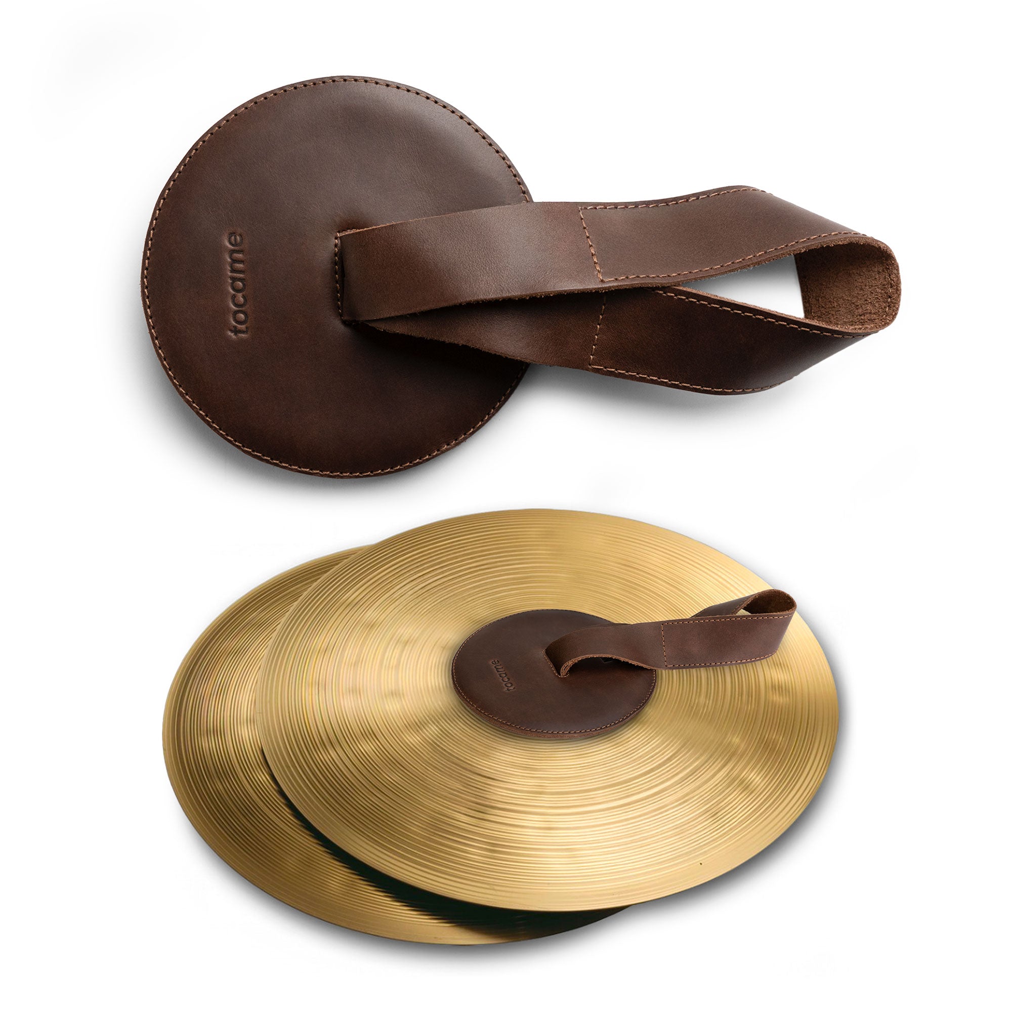 Set of 2 Cymbal Pads by tocame, featuring circular cushions designed for band instruments. These army cymbal pads with straps provide comfort while playing, showcasing the quality of full grain leather. Perfect for percussion players. Small batch production, hand cut, hand sewn in La Antigua, Guatemala.