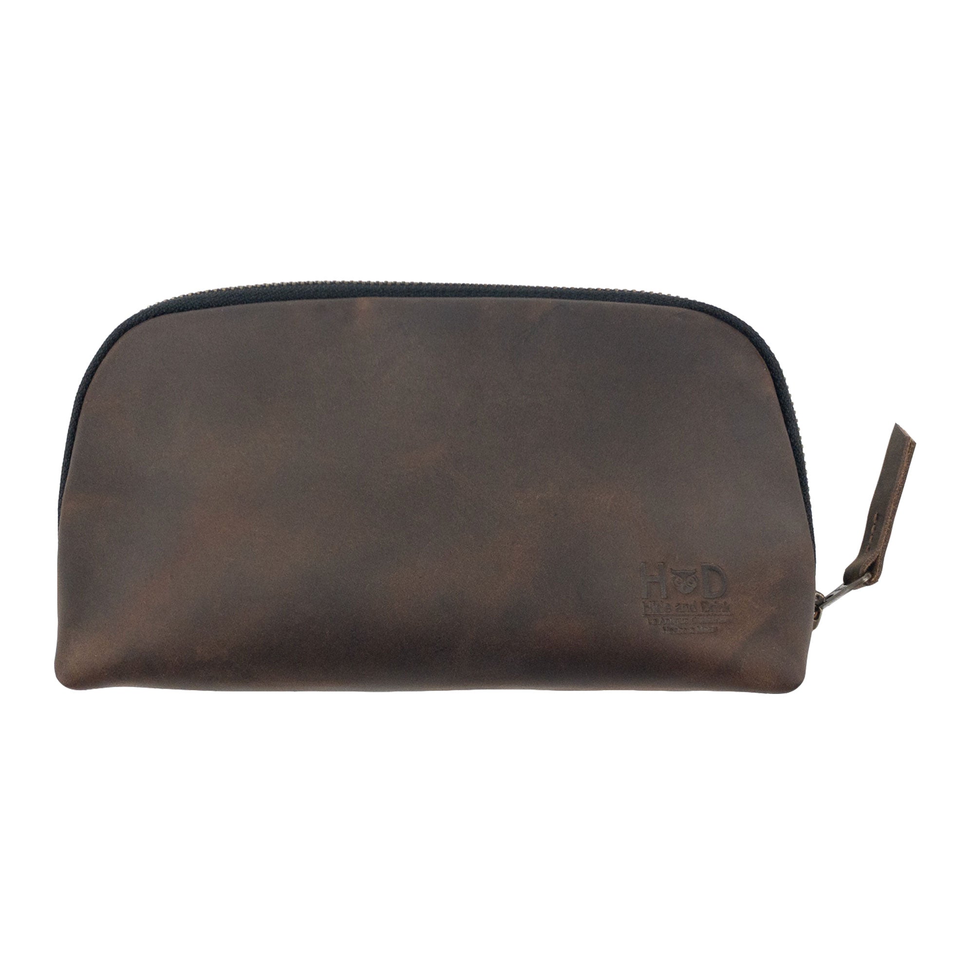 Hide & Drink's Small Tech Organizer, a rustic case made from full grain leather, serving as a stylish Small Tech Bag. Ideal travel accessory for charges and cables, features a zippered closure and exemplifies artisan craftsmanship with handmade details in La Antigua Guatemala & Oaxaca Mexico.