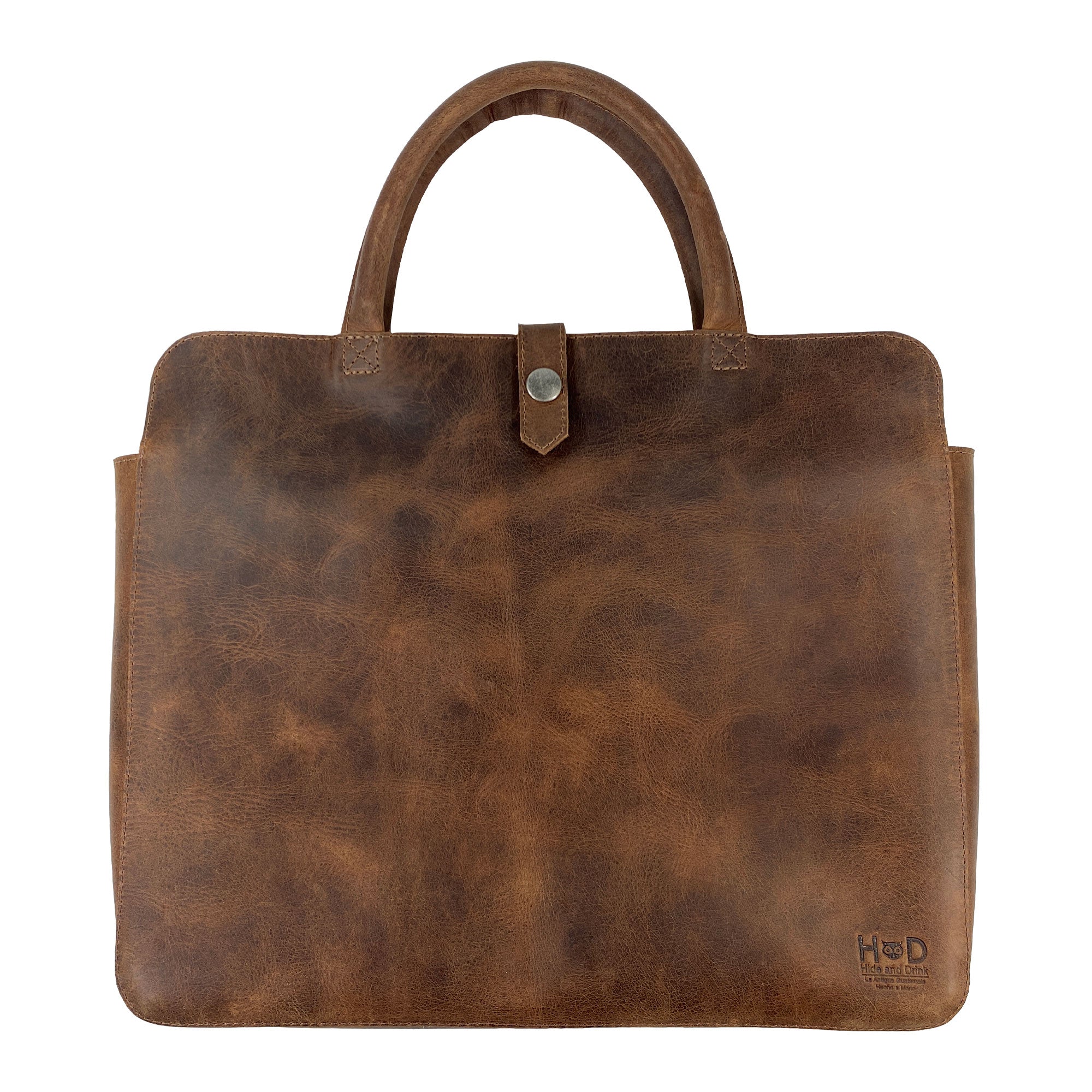 Front view of the Vintage Portfolio with Snap for 13" MacBook Air by Hide & Drink, showcasing its rich, Full Grain Leather finish, part of Small Batch Production. This Artisan, Handmade in La Antigua Guatemala & Oaxaca Mexico item is hand-cut, hand-sewn, and fire branded.