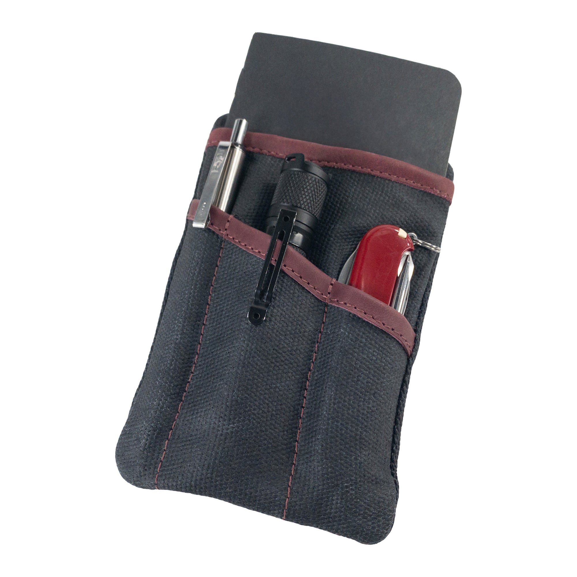 Multi-tool Pocket Pouch by Hide & Drink in teal, showcasing its modern design and durable construct meant for versatility.