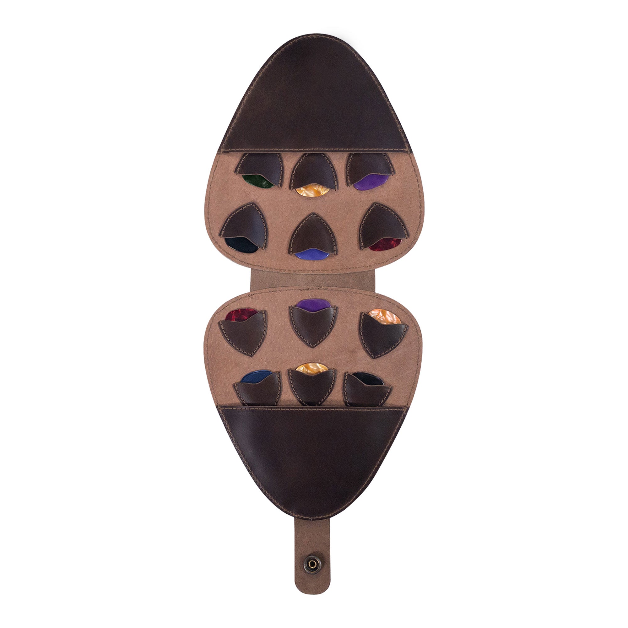 Guitar Pick Case (Guitar Picks Not Included) by tocame featuring an open view of the Guitar Pick Case with 12 Slots, made from Full Grain Leather. This Guitar Pick Holder is perfect for musicians seeking an artisan accessory with small batch production, hand cut and hand sewn details, fire branded to reflect craftsmanship, and is handmade in La Antigua Guatemala & Oaxaca Mexico.