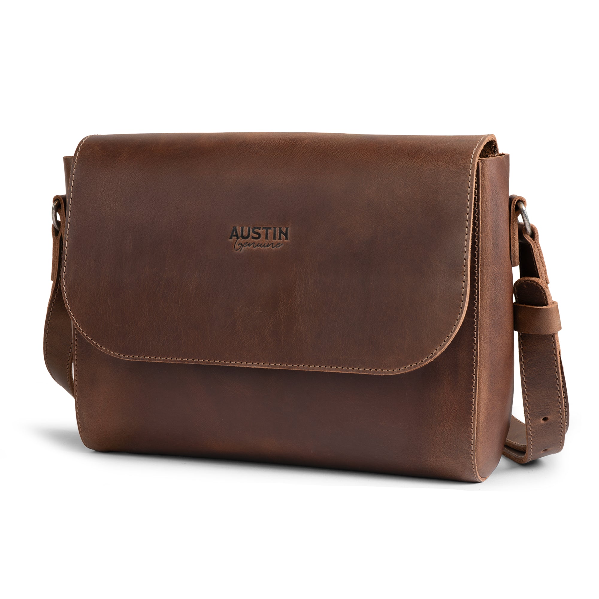 The Barton Purse by Austin Genuine is a stylish, full grain leather messenger bag showcasing a rich brown finish, inspired by Austin’s bold passion, vibrant popular culture, and unmistakable Texas spirit. This artisan handmade bag is produced in small batches in La Antigua Guatemala & Oaxaca Mexico.