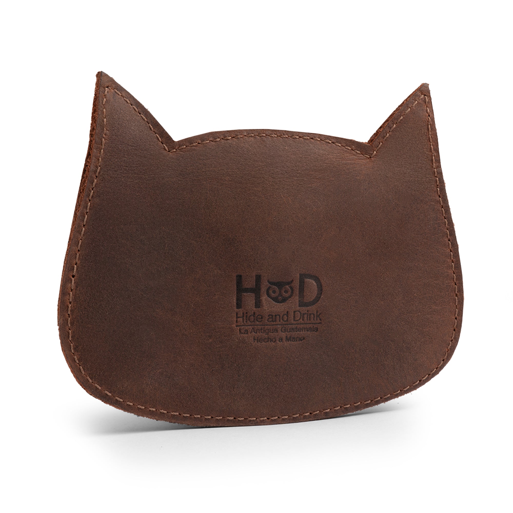 Hide & Drink Leather Cat Wallet closed with a button, showcasing its design. This Full Grain Leather Cat-Shaped Wallet is perfect for organizing your coins and bills, made by dedicated artisans in La Antigua Guatemala & Oaxaca Mexico.