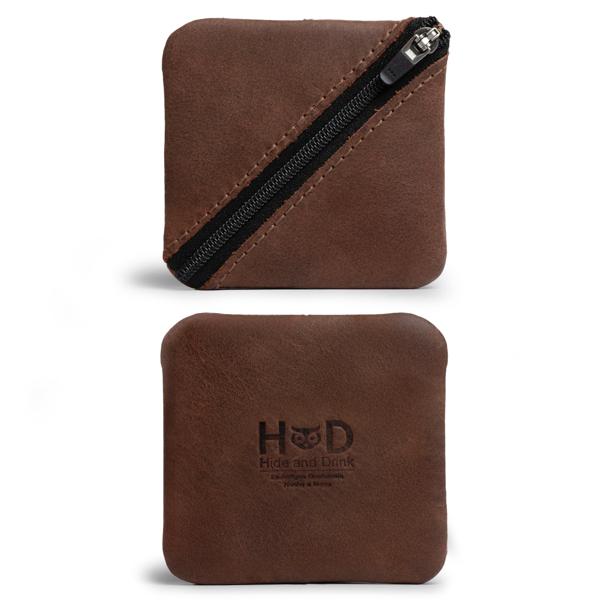 Slash Zippered Pouch by Hide & Drink, showcasing a durable full grain leather design with a stylish diagonal zipper. Ideal for change holder and storage, perfect for pocket and purse organization. Made in La Antigua Guatemala and Oaxaca Mexico with artisan craftsmanship.