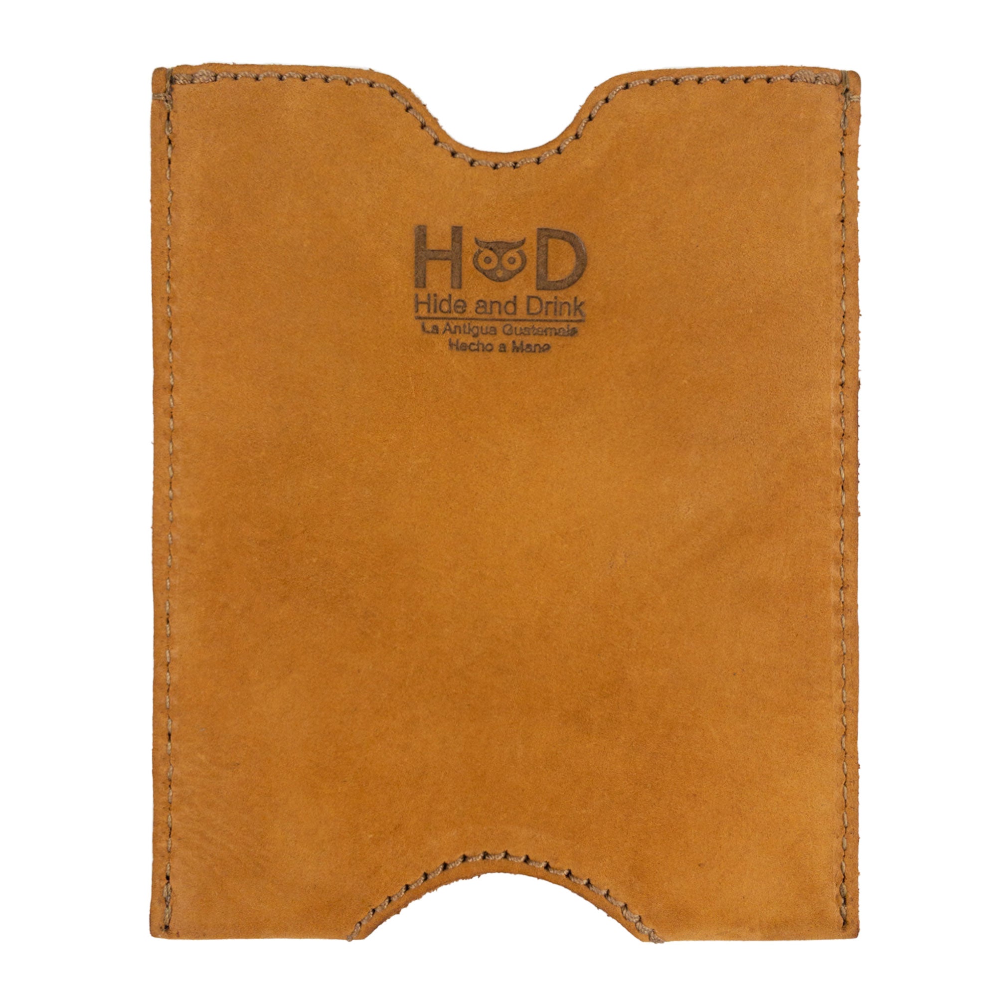 Hide & Drink Passport Sleeve featuring a simple design with the brand logo, made of Full Grain Leather for a stylish Travel Passport Pocket Sleeve. Handmade in La Antigua Guatemala & Oaxaca Mexico, this artisan product showcases small batch production with meticulous hand cut and hand sewn craftsmanship, plus fire branded details.