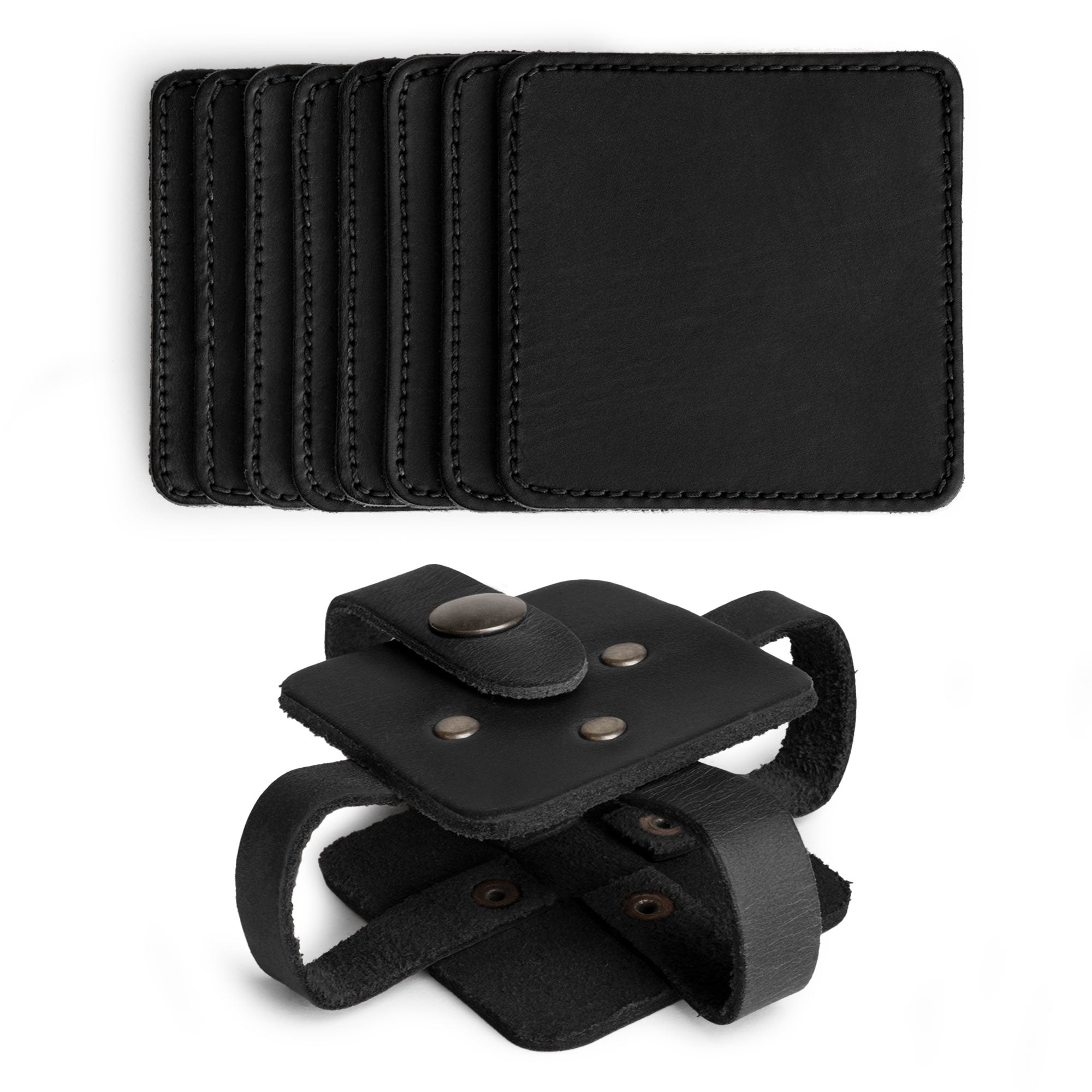 Vintage Squared Coaster (8 pack) by Hide & Drink, showcasing black coasters stacked together. This coasters set of 8 offers excellent table protection for drinks while providing an elegant accessory for any setting. Crafted from quality full grain leather, each piece is hand cut, hand sewn, and fire branded, reflecting artisan skills from La Antigua Guatemala & Oaxaca Mexico.