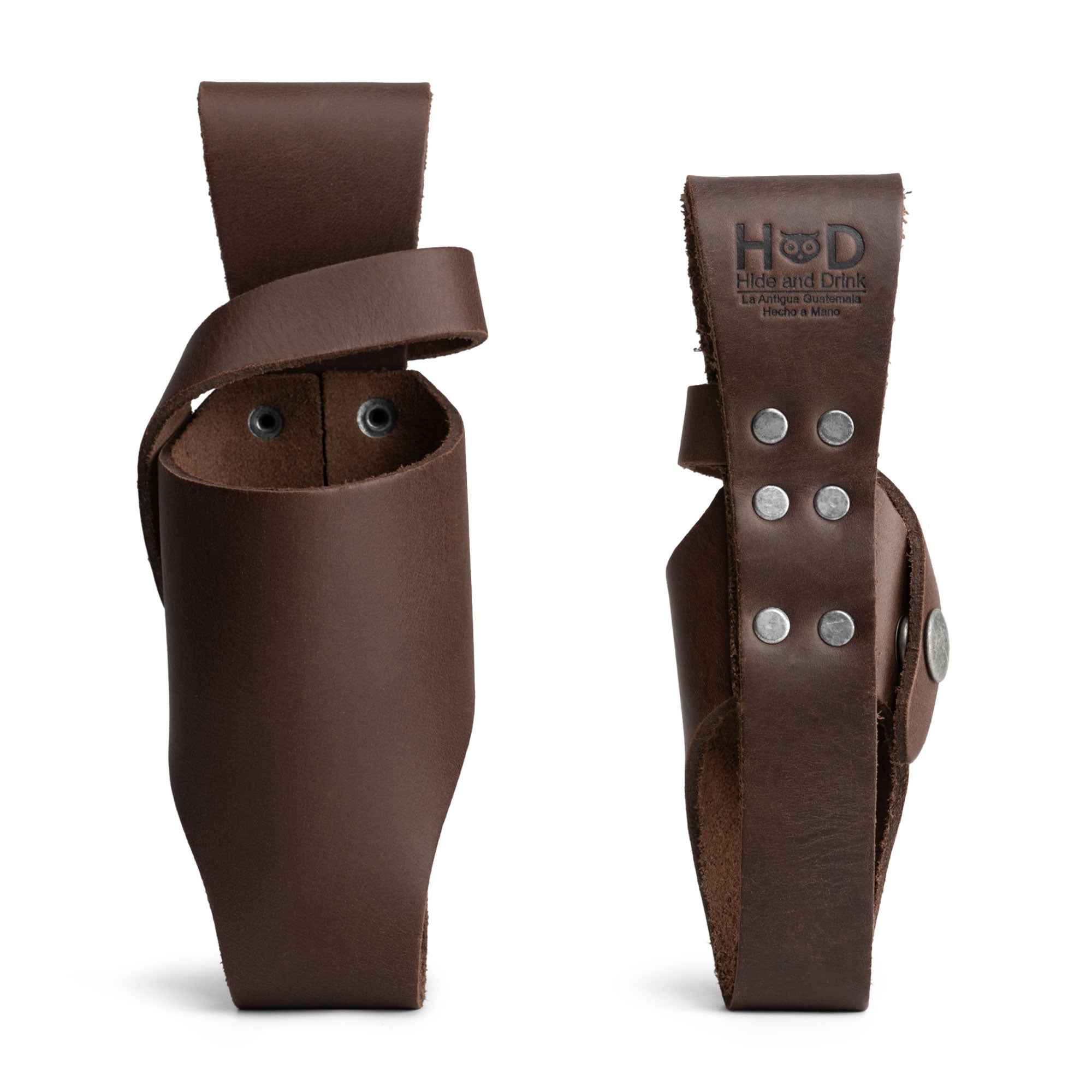Hide & Drink Tabasco Holsters (2pk) displaying a stylish, handcrafted 5oz and 2oz bottle holder. This product is perfect for gripping hot sauces like Tabasco and Cholulah. Made of durable full grain leather, showcasing small batch production, artisan qualities, and handmade in La Antigua Guatemala & Oaxaca Mexico.