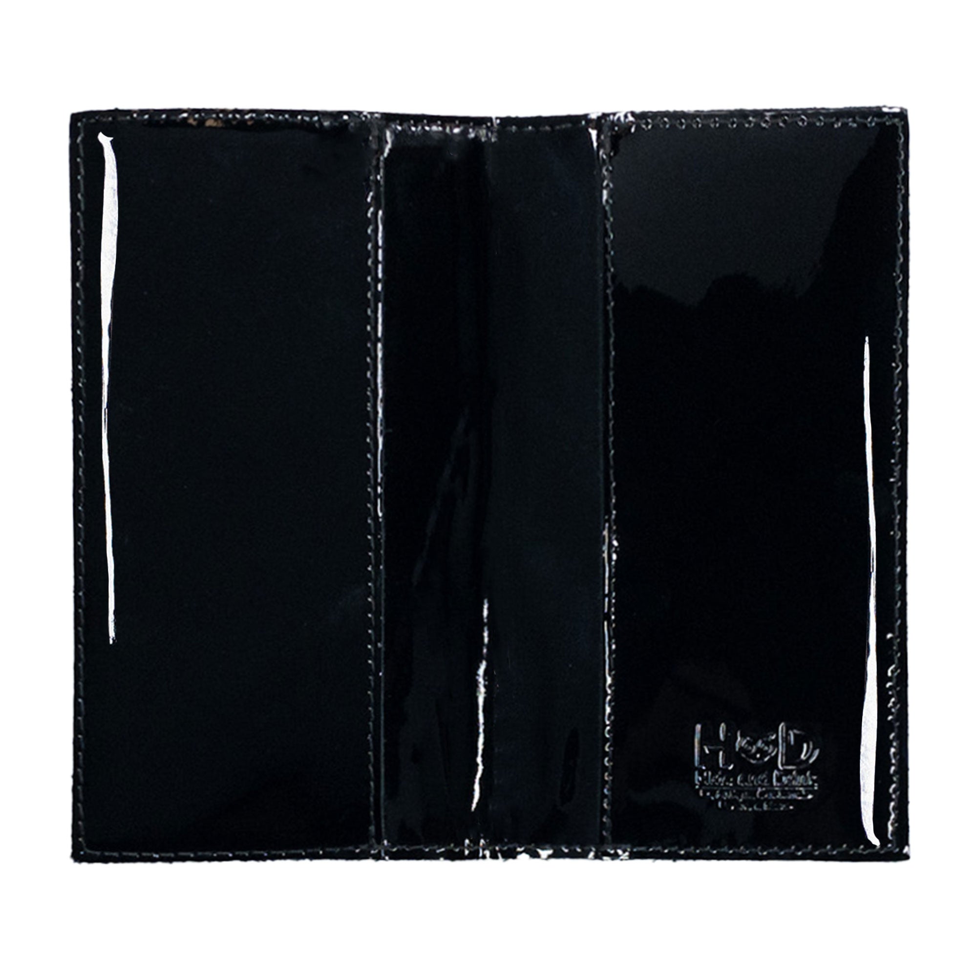 The Checkbook Leather Cover by Hide & Drink presented in a simple yet elegant design, serving as a minimalist organizer for standard checkbooks. Handmade from full grain leather, this artisan product is crafted in La Antigua Guatemala and Oaxaca Mexico, emphasizing small batch production.