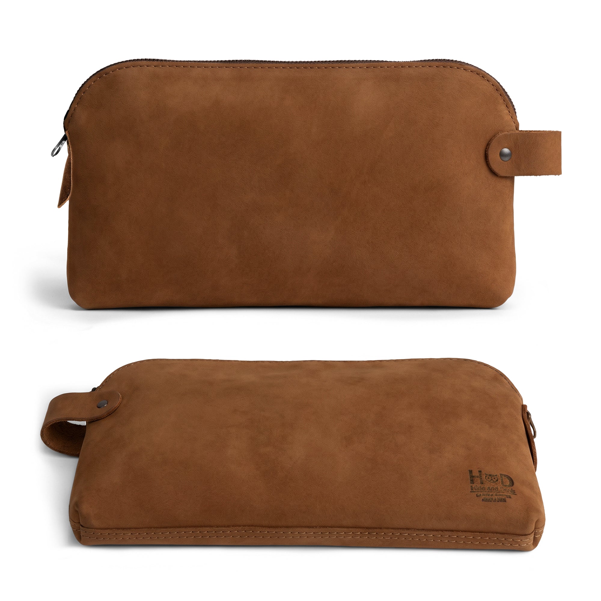 Dopp Kit Utility Bag by Hide & Drink showing a warm tone of leather that enhances its rustic appeal. This bag is the perfect large rustic all-purpose Dopp Kit Utility Bag for cords & chargers, designed with artisan skills including hand cut and hand sewn details, handmade in La Antigua Guatemala & Oaxaca Mexico.