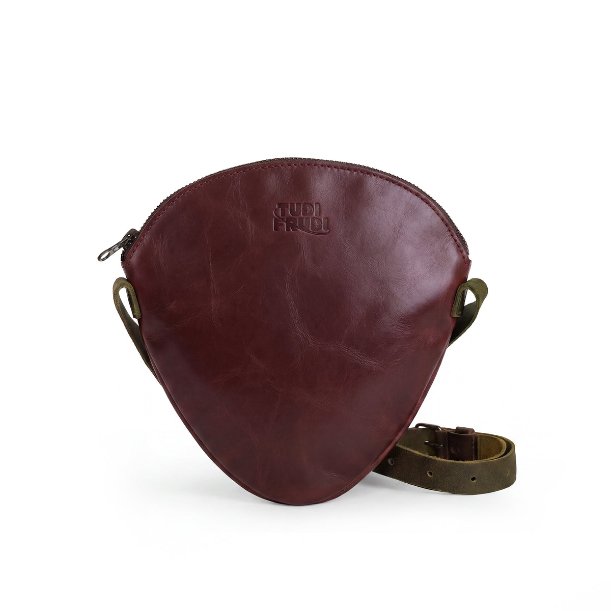 Open view of the Leather Strawberry-Shaped Shoulder Bag by Tudi Frudi, highlighting its zipper closure and spacious interior. This bag made from Full Grain Leather emphasizes the artisanal quality of small batch production, showcasing hand-cut and hand-sewn details, all handmade in La Antigua Guatemala & Oaxaca Mexico.