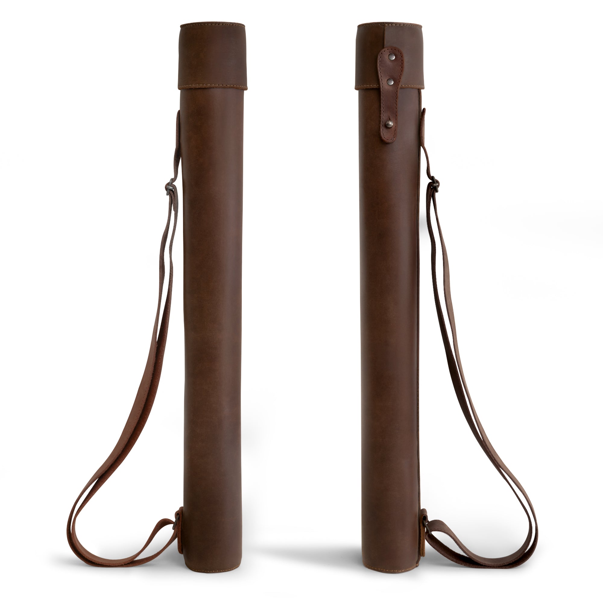 Hide & Drink's Blueprint Tube (A2 Paper Size) shown from the side, ideal for storing architectural plans. This document storage tube is made of durable full grain leather with an adjustable strap and represents the artisan craftsmanship of StockyardX in small batch production, hand cut and sewn in La Antigua Guatemala & Oaxaca Mexico.