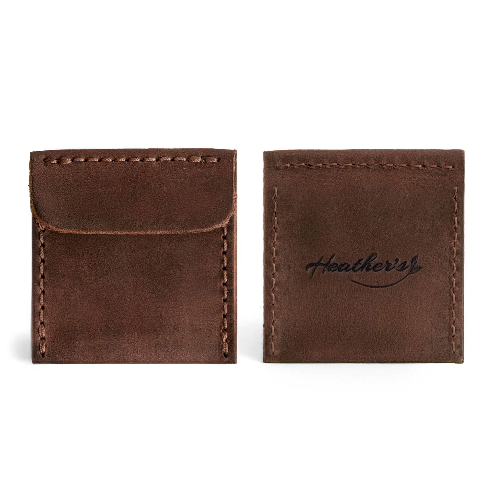 Stylish exterior view of Heather's Wedding Ring Case, an engagement pouch designed for bride and groom jewelry storage. Perfect for marriage travel or as a ring bearer accessory, this full grain leather case is an artisan product made through small batch production processes. Each piece is both hand cut and hand sewn, showcasing the quality associated with Heather's, handmade in La Antigua Guatemala & Oaxaca Mexico.