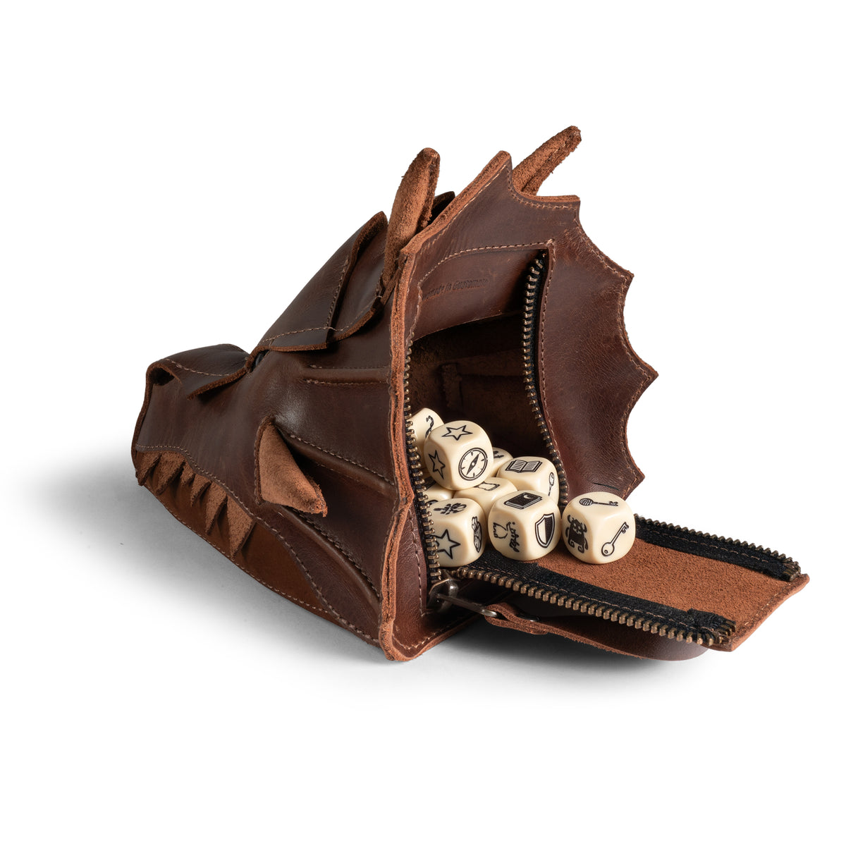 Open Tudi Frudi Leather Dragon Head Pouch displaying dice inside its zippered compartment, designed as a Coin Purse, Small Charger Cable Holder, Change Bag, and Scissors Case for Purses & Pouches for Cash; Travel Zippered Full Grain Leather accessory by StockyardX, created through Small Batch Production, Hand Cut, Hand Sewn, Fire Branded Artisan craftsmanship, Handmade in La Antigua Guatemala & Oaxaca Mexico.