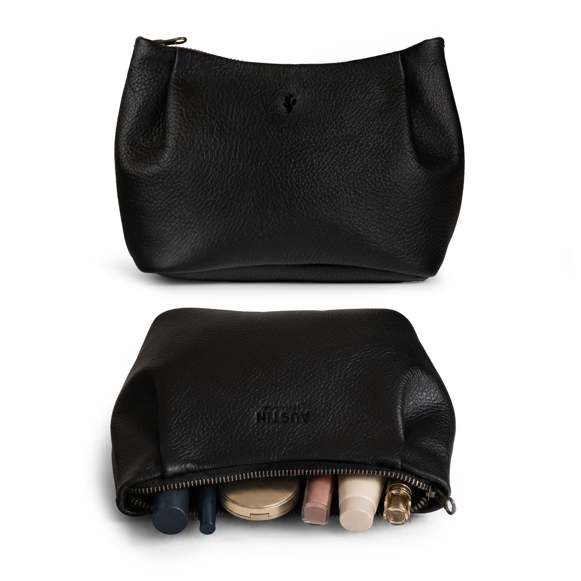 Austin Genuine The Kinney Beauty Bag shown open with cosmetics and everyday essentials inside, made from The Kinney Beauty Bag Full Grain Leather through StockyardX, Small Batch Production, Hand Cut, Hand Sewn, Fire Branded, Artisan, Handmade in La Antigua Guatemala & Oaxaca Mexico craftsmanship.