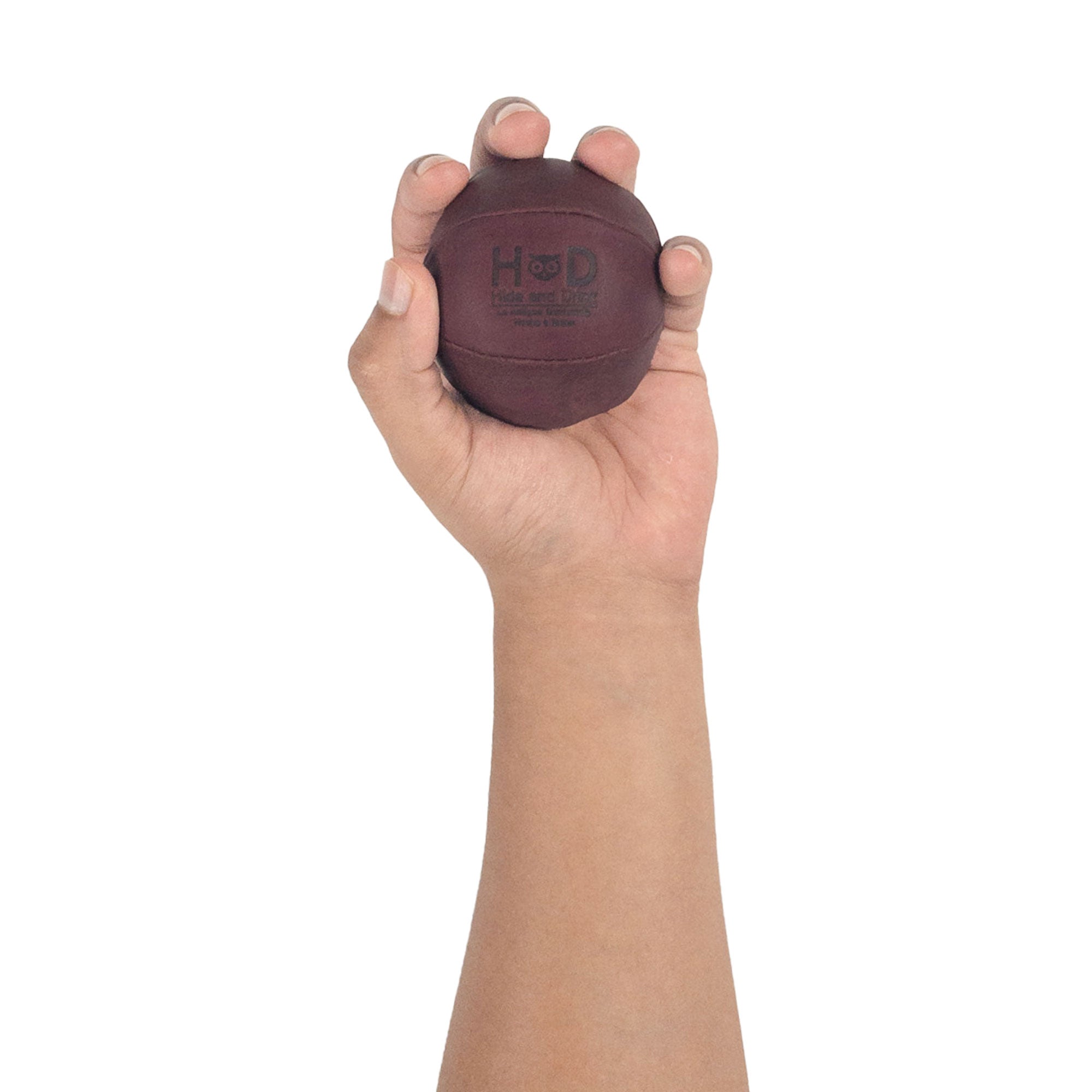 Hide & Drink maroon Stress Ball held firmly, perfect for alleviating fidgeting and anxiety. This squishy tension accessory features a classic design and is artisan crafted from full grain leather in La Antigua Guatemala.