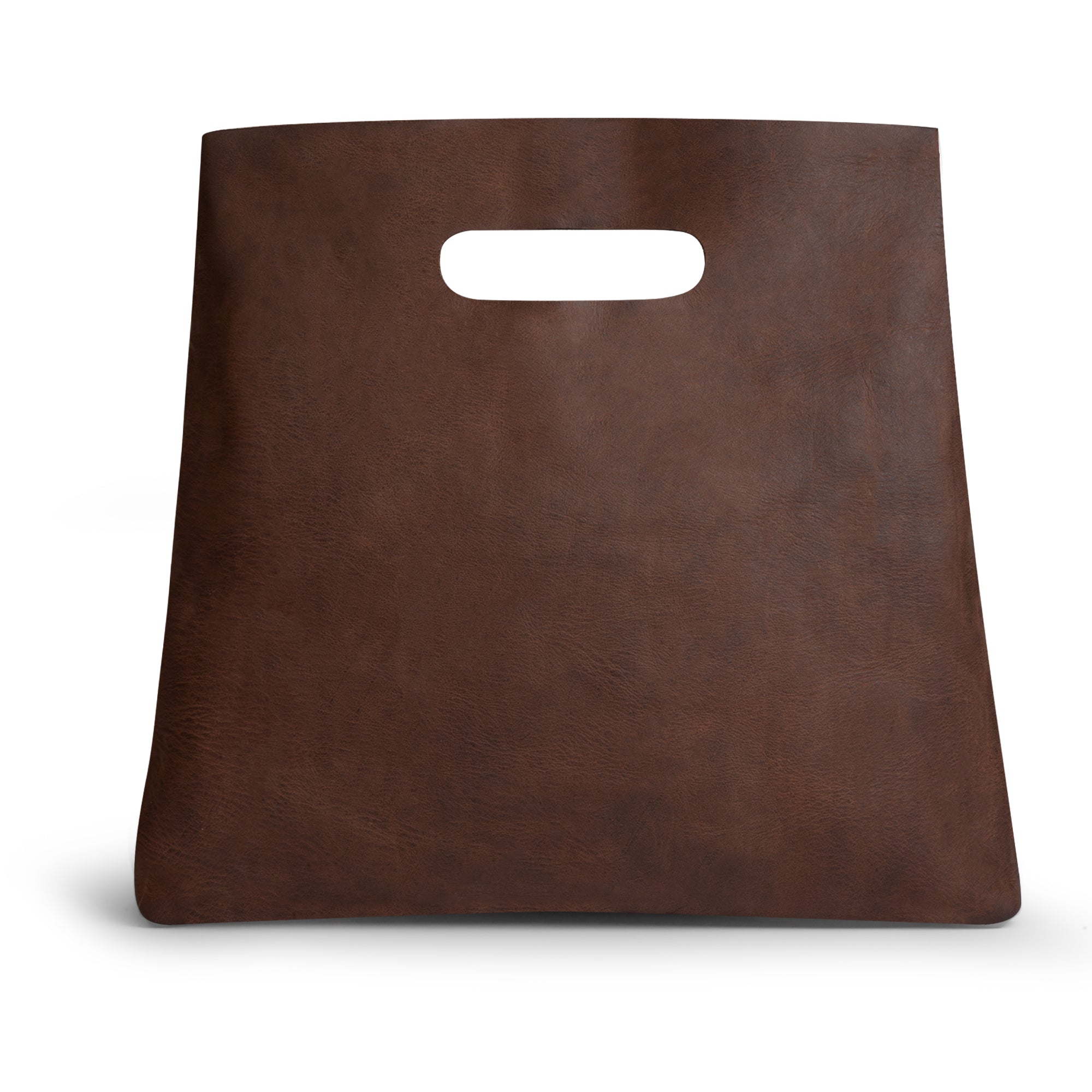 Close-up view of the Hide & Drink Minimalist Boho Handbag highlighting its sturdy Full Grain Leather construction. This artisan-made rustic purse is perfect for shopping or daily use, showcasing small batch production from La Antigua Guatemala & Oaxaca Mexico.