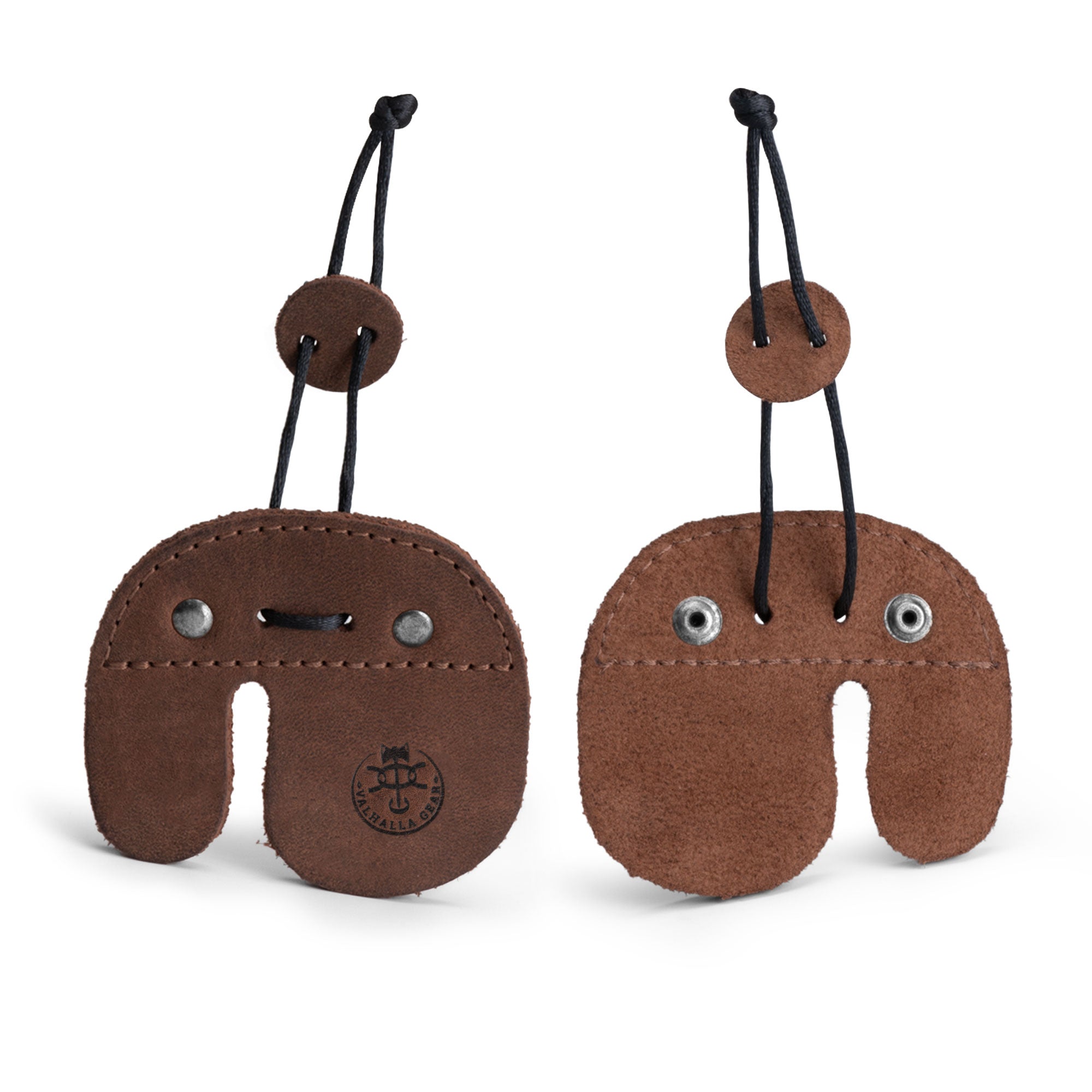 The Right Handed Archery Finger Tab by Valhalla Gear displayed on a white background, highlighting its unique shape and quality full grain leather. This finger protector is perfect for anyone practicing archery with recurve bows, featuring artisan craftsmanship. Handmade in La Antigua Guatemala, it's a must-have for sports enthusiasts seeking durable outdoor gear.