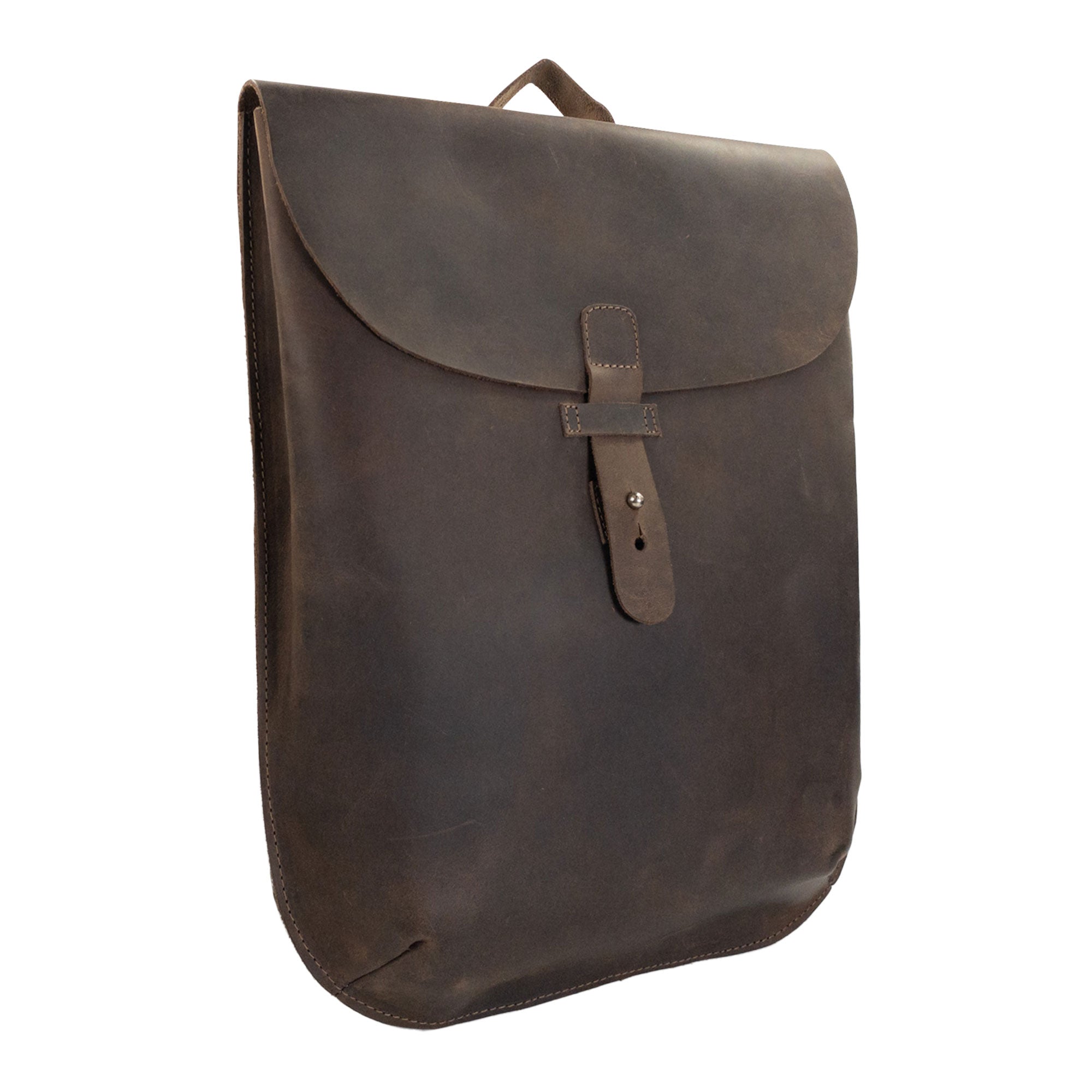 Close-up of Hide & Drink's Rounded Laptop Backpack with Adjustable Straps showcasing its timeless design. Crafted from premium full grain leather, this portable case doubles as a practical travel accessory. Made with artisan skills in La Antigua Guatemala & Oaxaca Mexico, it's perfect for stylish commuters.