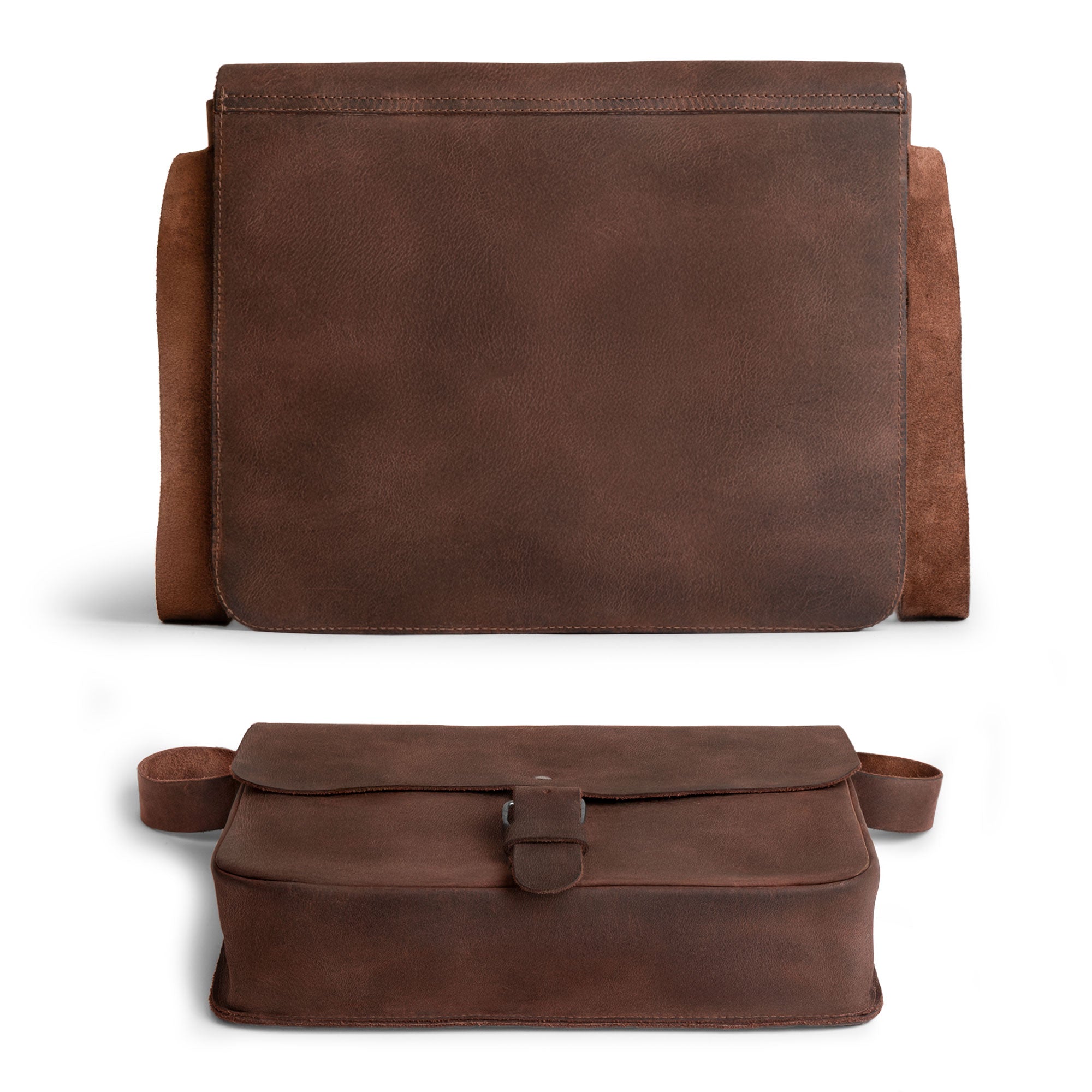 Hide & Drink’s Small Messenger Bag with tags, revealing its craftsmanship and origin. Made from high-quality Full Grain Leather, this durable crossbody bag represents a perfect travel accessory, artfully hand cut and sewn by artisans in La Antigua Guatemala & Oaxaca Mexico.