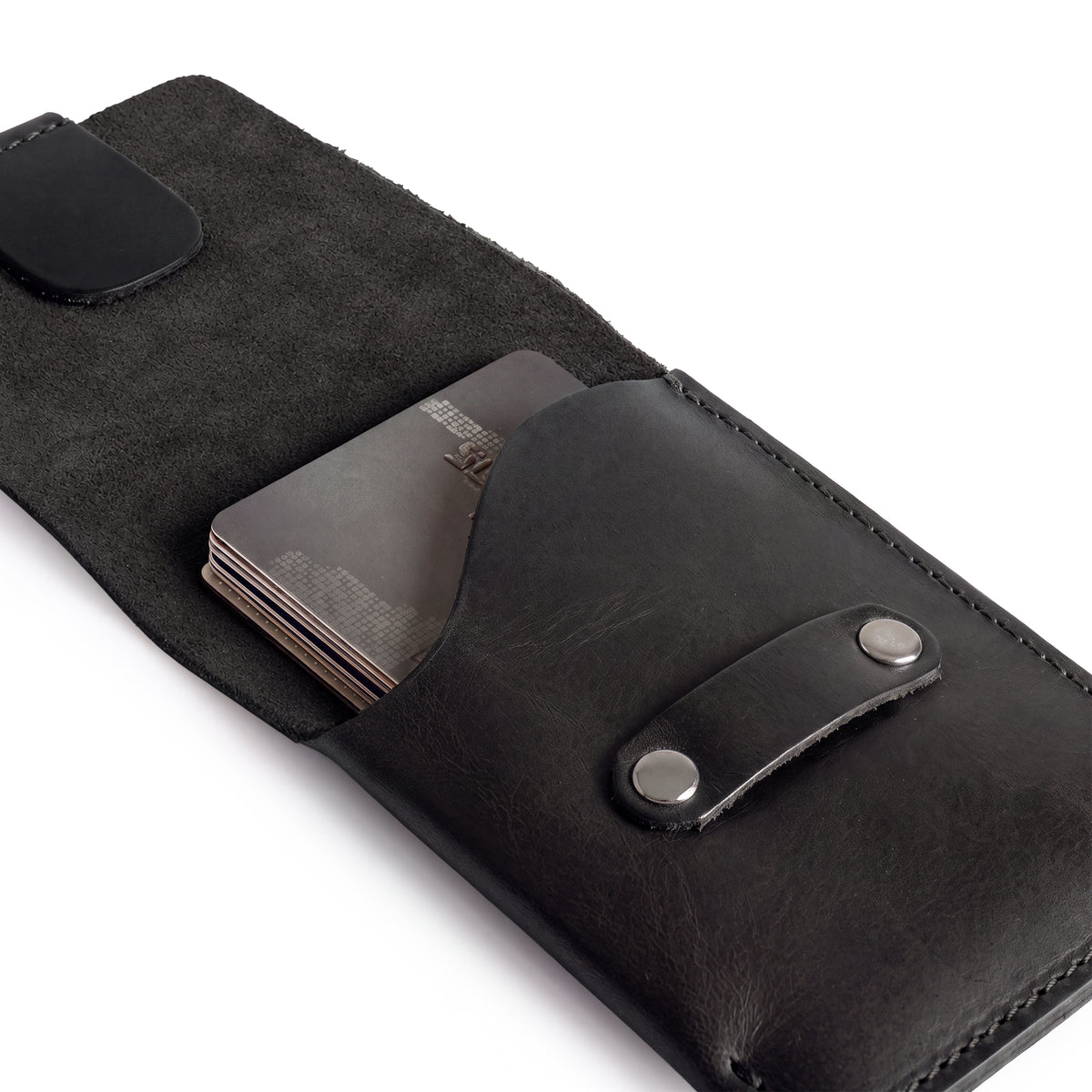 Hide & Drink Slim Card Holder open to show cards and cash, showcasing its functionality as a pocket wallet. Handcrafted from full grain leather, this organizer holds up to 4 cards plus folded bills, highlighting artisan production in La Antigua Guatemala.