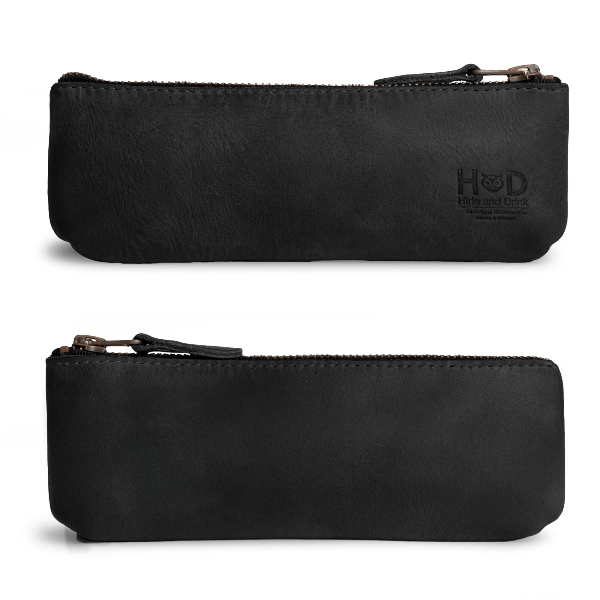 Hide & Drink Pencil Pouch featuring its elegant rectangular shape in a deep shade, emphasizing its function as a stylish pen and marker pouch for artists and everyday use. This flat zippered holder is crafted from durable full grain leather, handmade with care by artisans in La Antigua Guatemala & Oaxaca Mexico for a unique quality.